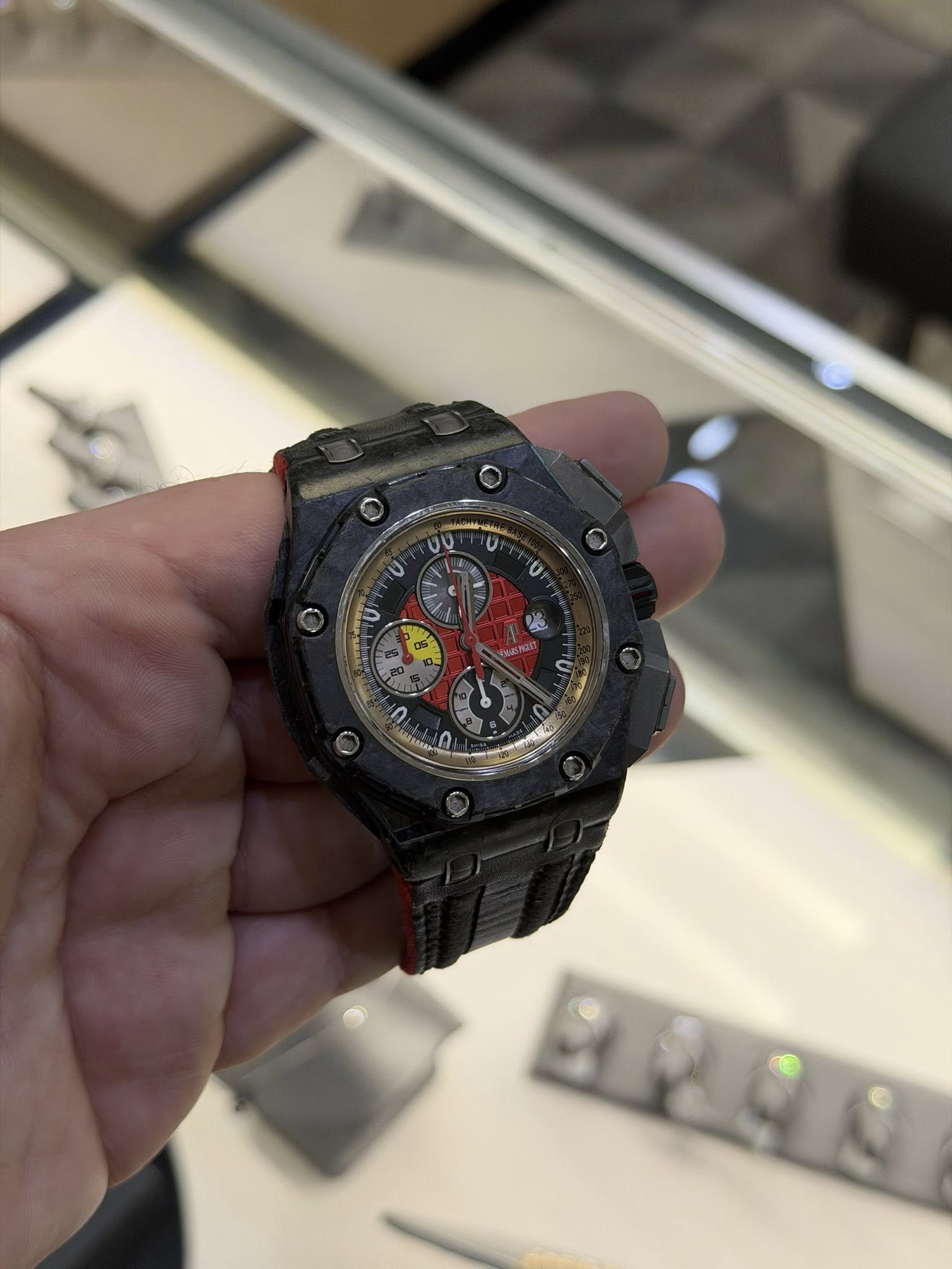 May be an image of wrist watch and text