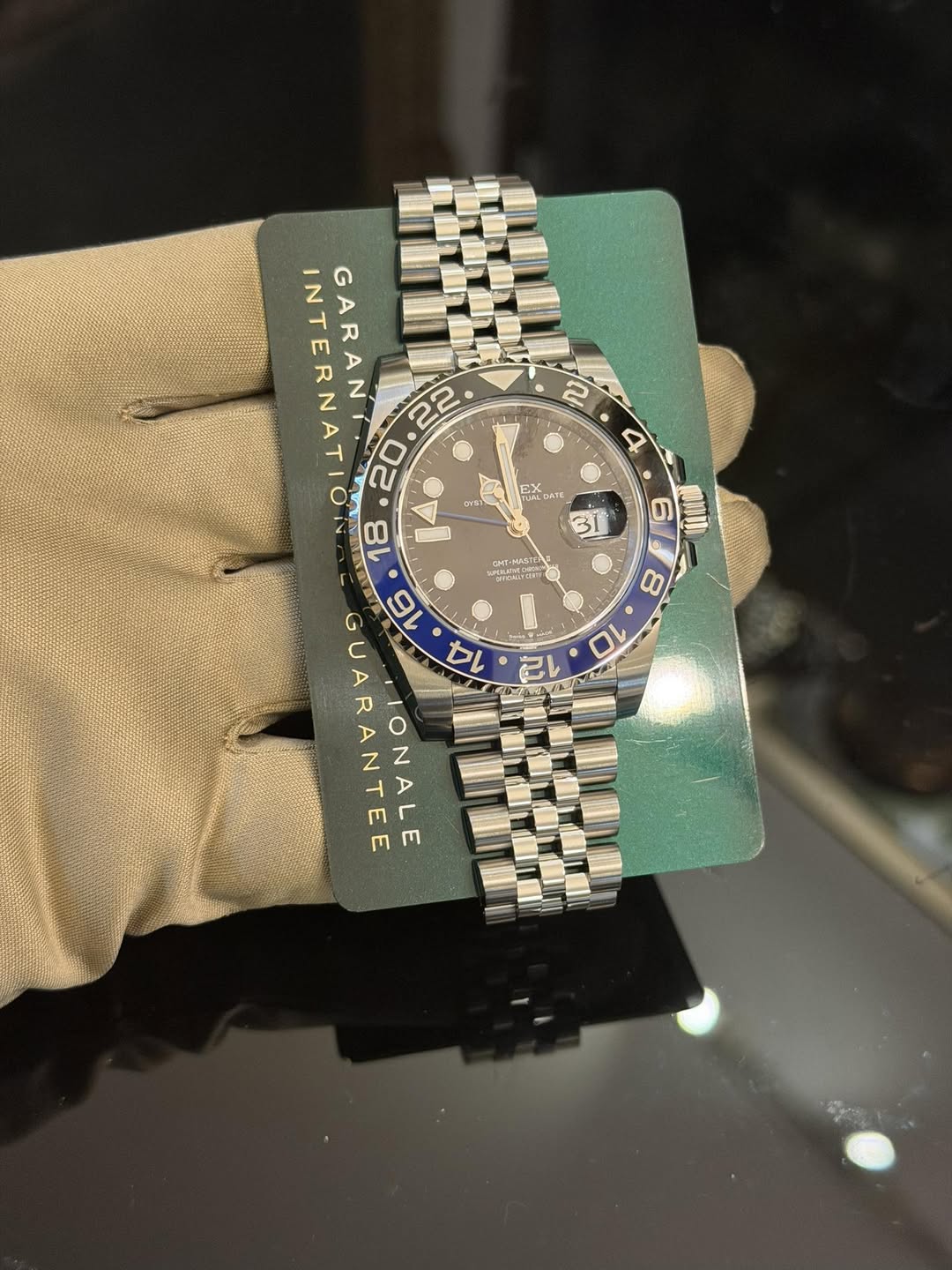 May be an image of wrist watch and text