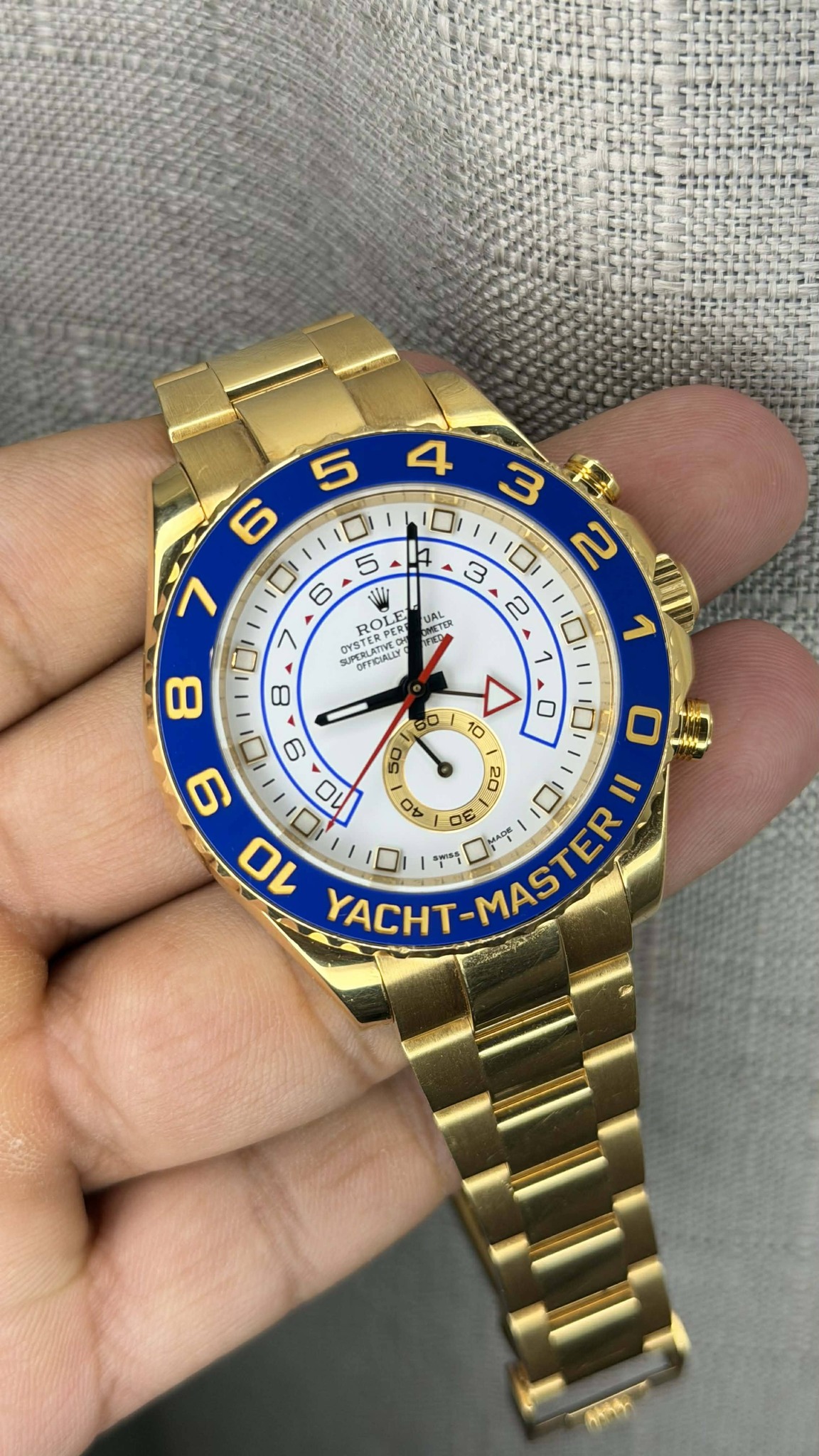 May be an image of wrist watch and text