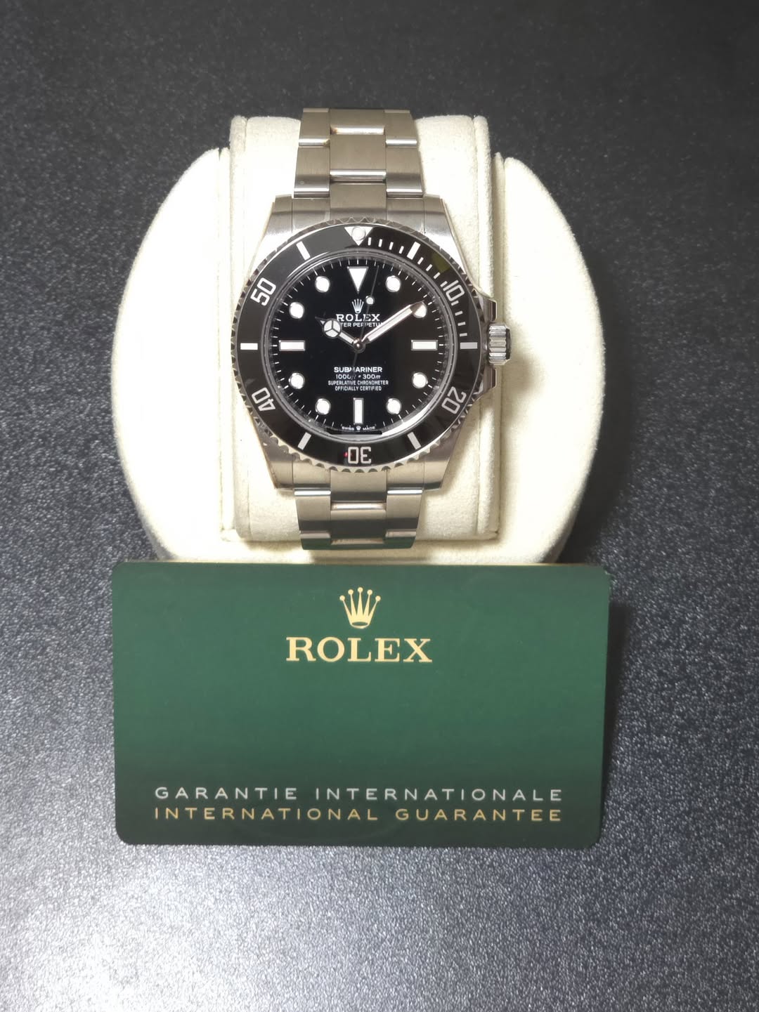 May be an image of wrist watch and text that says '50 HIN ထ iX 10 SUSP ARINER รูถ0ู 305 ICOG SMUIT SEERETTS ACPETES 40 20 30 ROLEX GARANTIE INTERNATIONALE INTERNATIONAL…