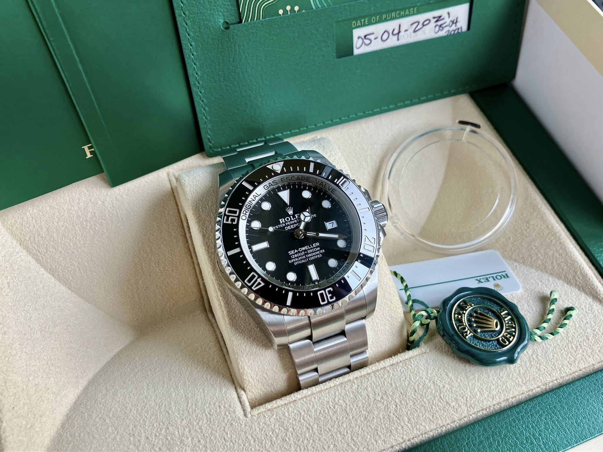 May be an image of wrist watch and text