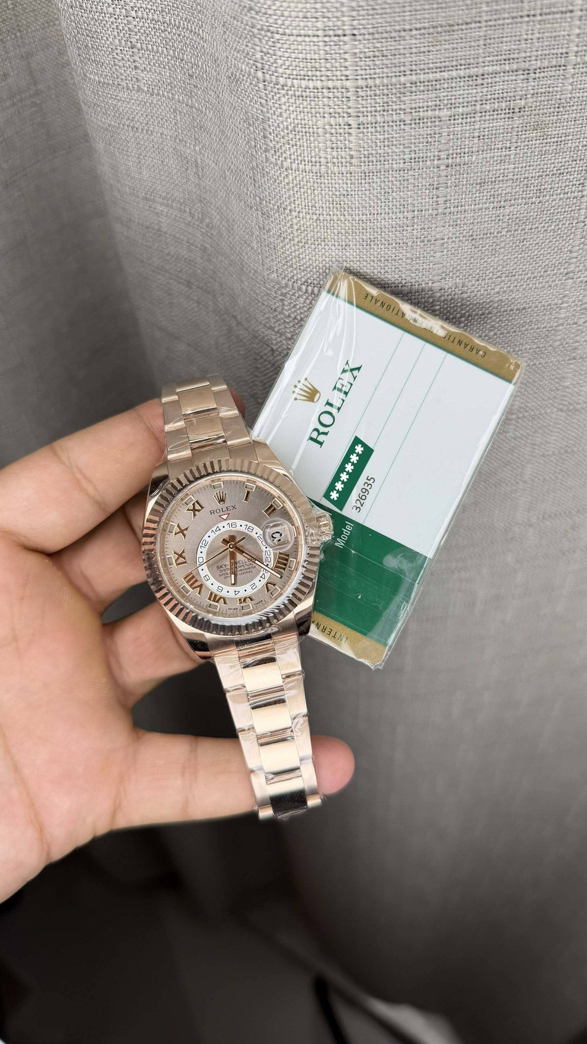 May be an image of wrist watch and text