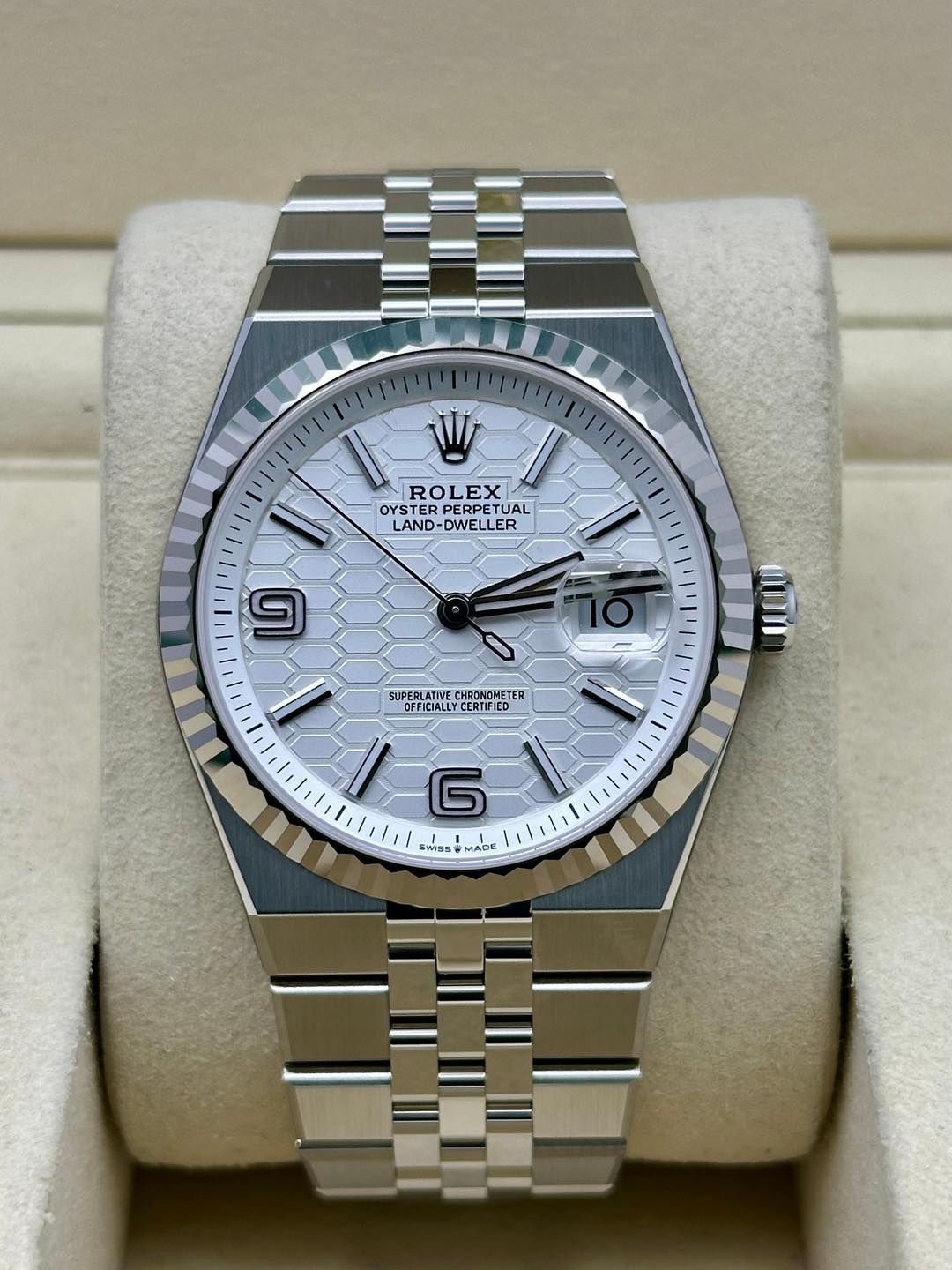 May be an image of wrist watch and text that says 'W ROLEX OYSTER OYTEREETUAL OYS YSTERPERPET PERPET TUAL LAND-DWELLER ER R LAND- DWE 9 T0 SUPERLATIVE CHRONOMETE…