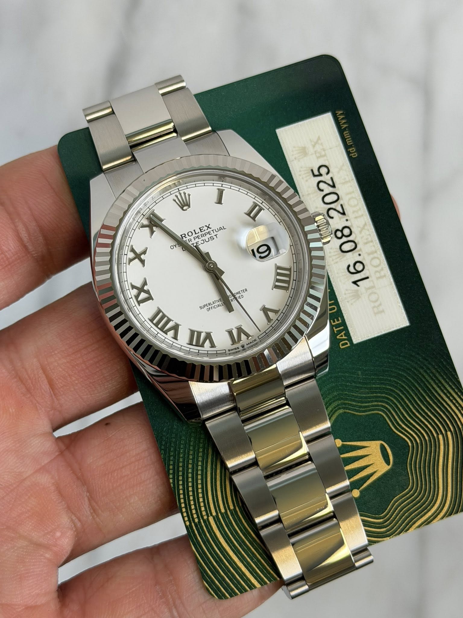 May be an image of wrist watch and text that says 'I 西 ROLE ROLEX.. RPERPETUAL LEX TUAL RPERPETUA RPERPE Oy TEJUST EX II 2025 mIUI X 9 08 IX CHETED III . RO II 1 ROI VIII Bca BAO…