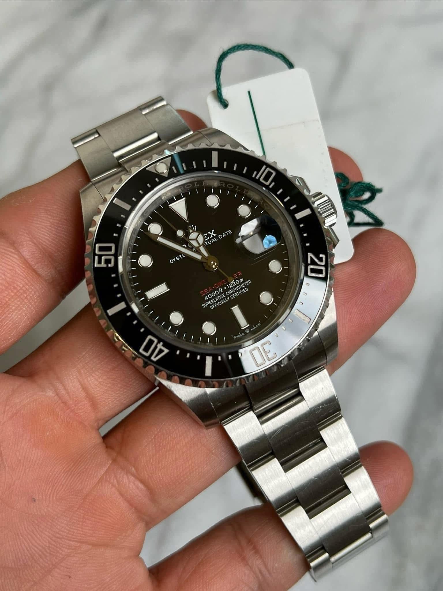 May be an image of wrist watch and text
