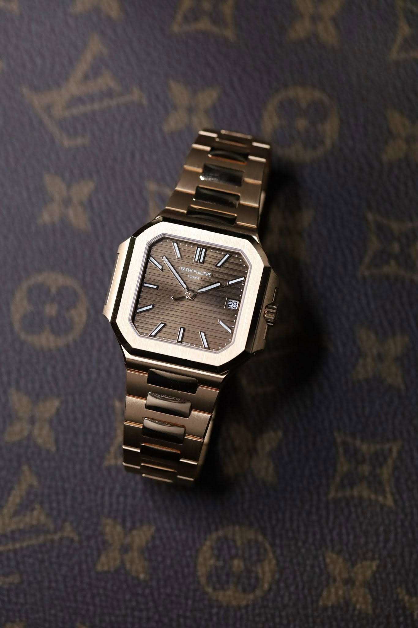 May be an image of wrist watch and text