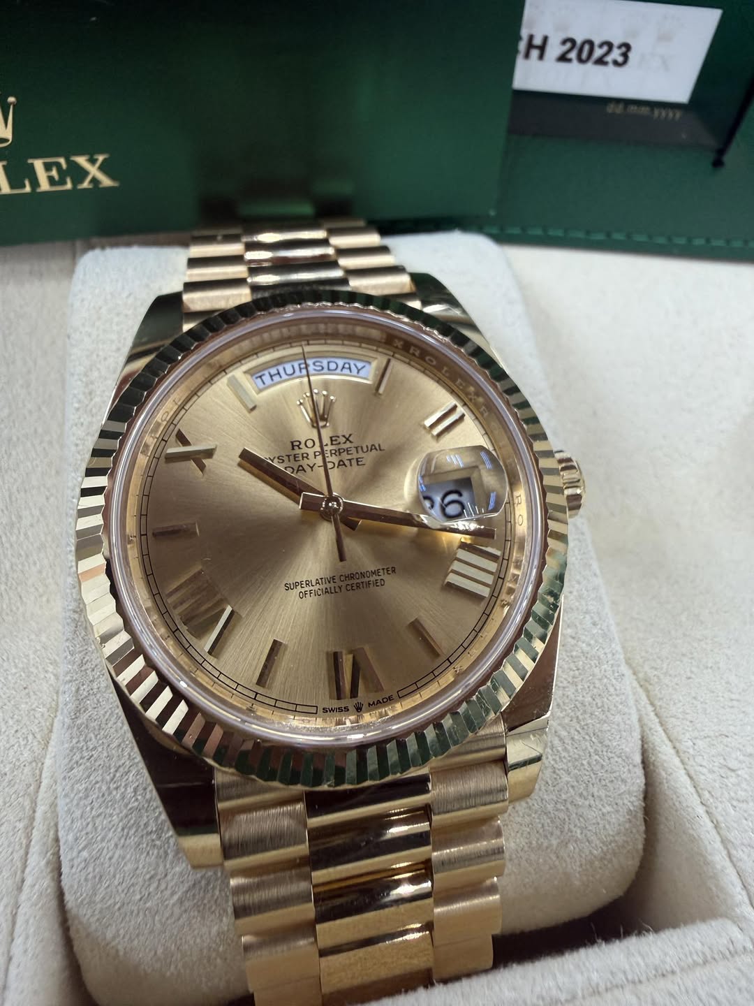May be an image of wrist watch and text