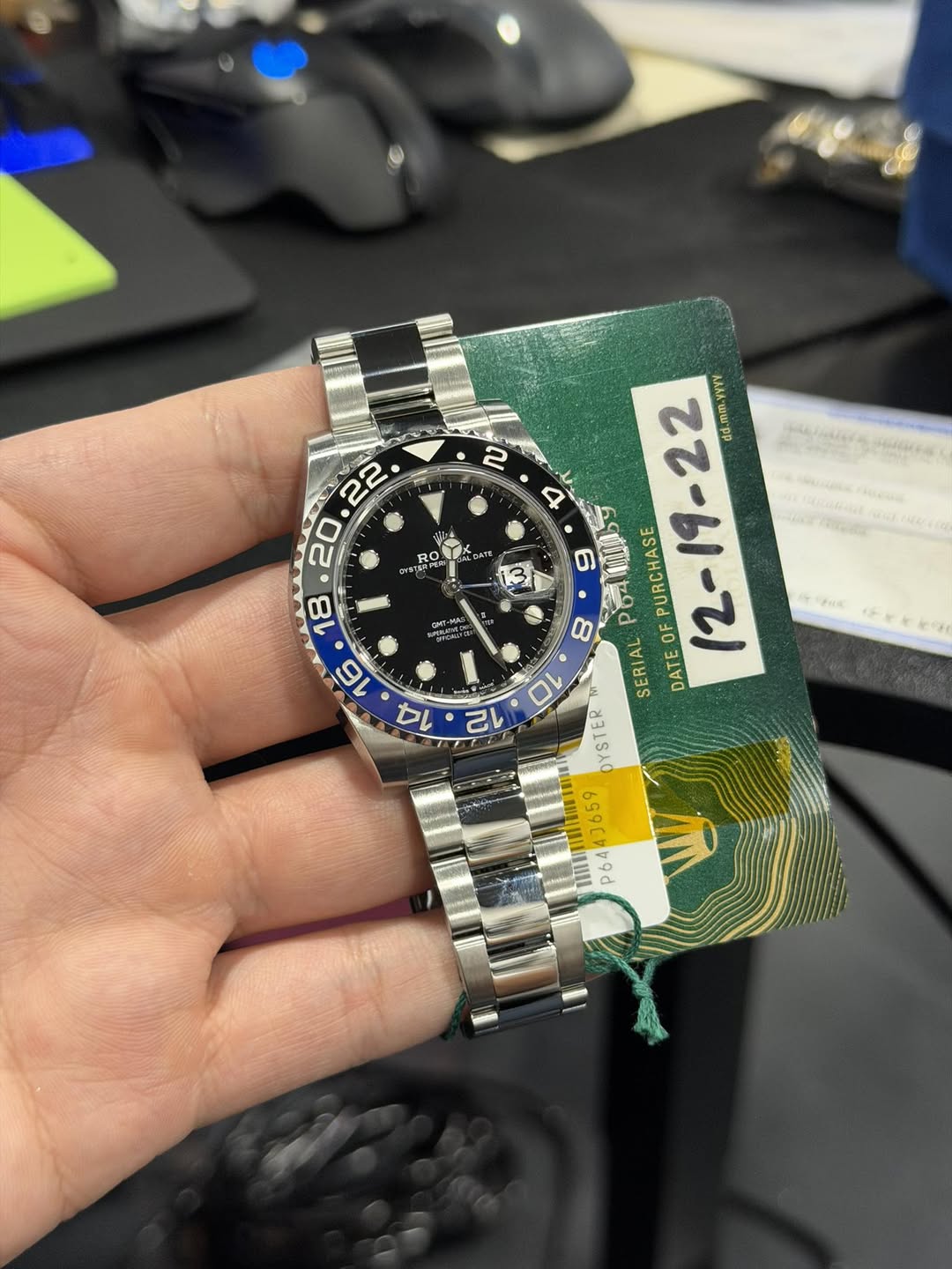May be an image of wrist watch and text