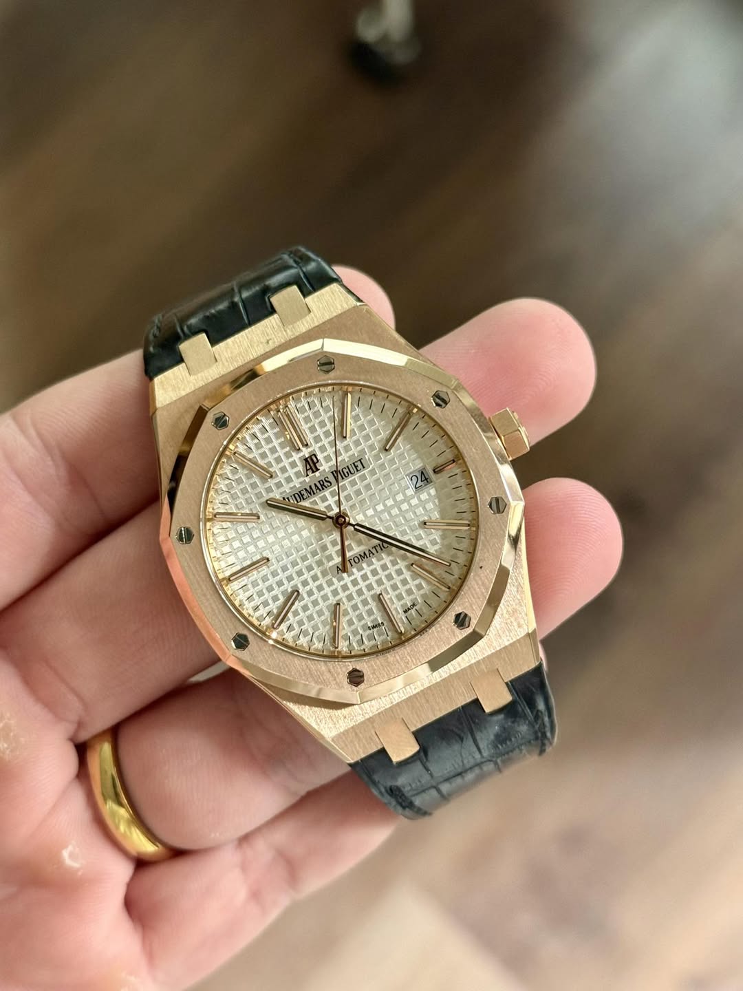 May be an image of wrist watch and text