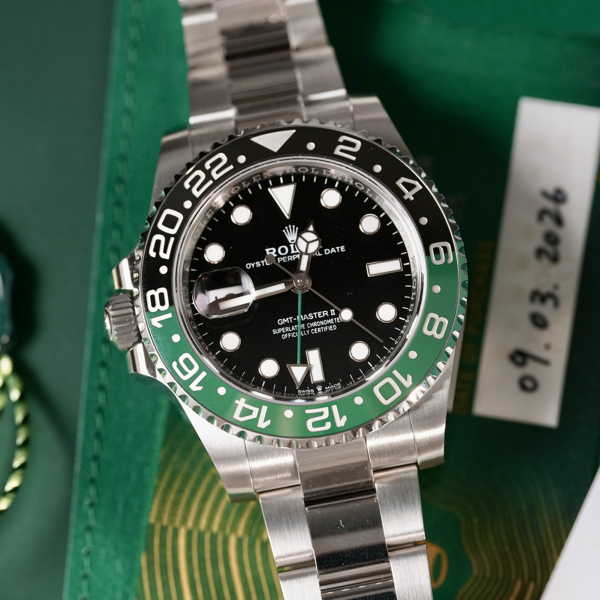 May be an image of wrist watch and text