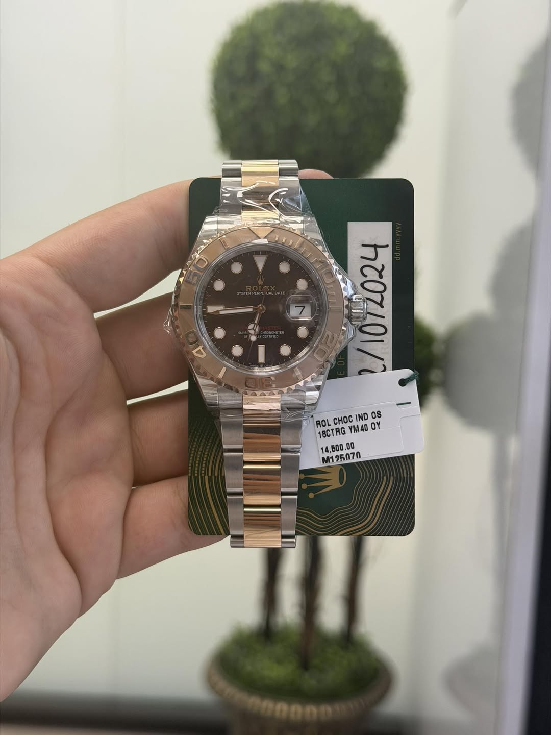 May be an image of wrist watch and text