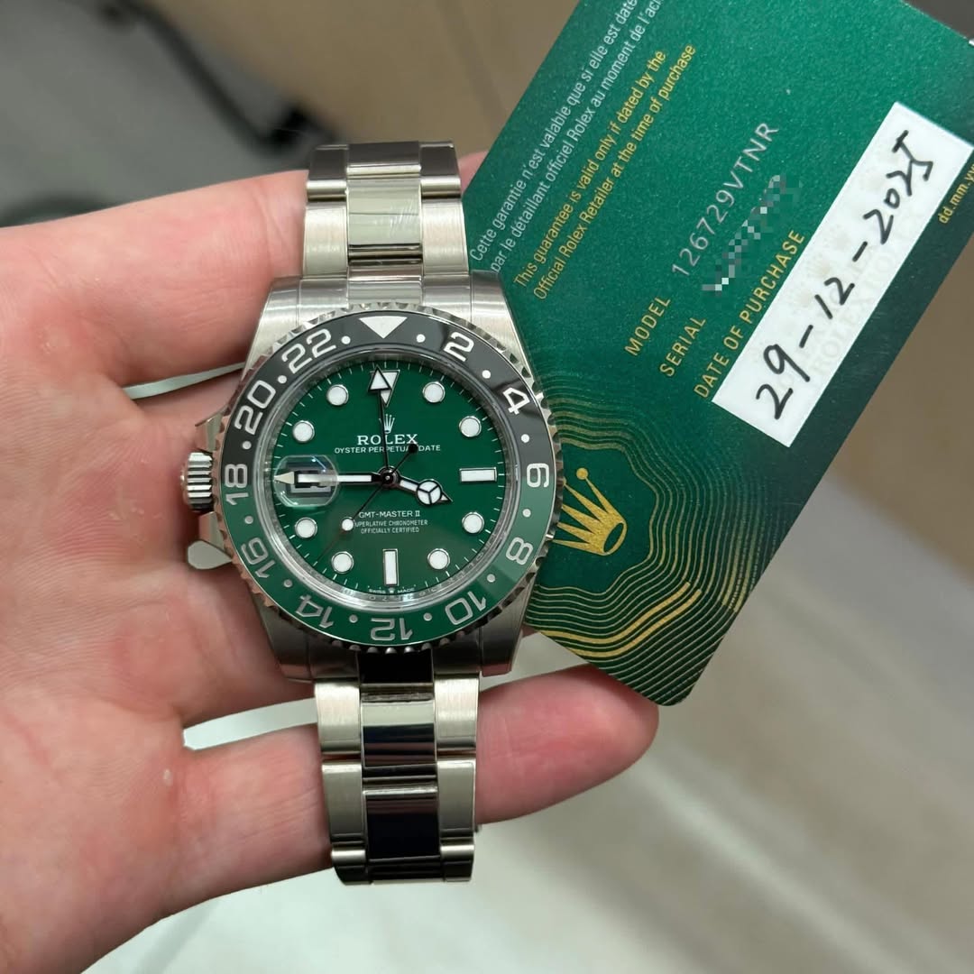 May be an image of wrist watch and text that says 'l'ac est que elle moment the purchase alabie officiel Role nly datedby αιοο time 126729VTNR M Role es estY offici valid only the…