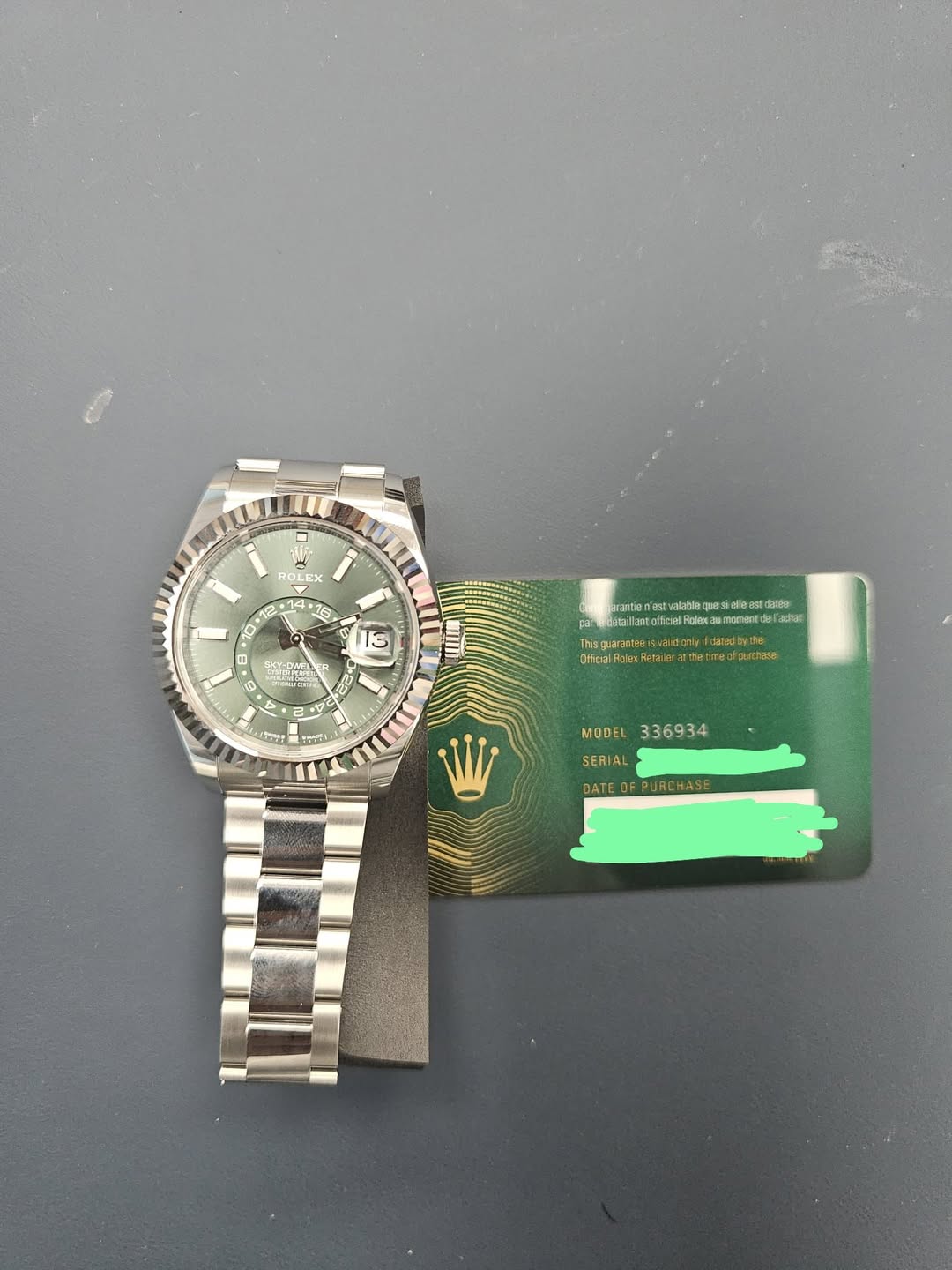 May be an image of wrist watch and text
