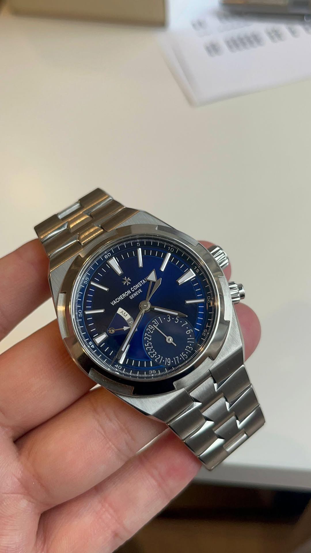 May be an image of wrist watch and text