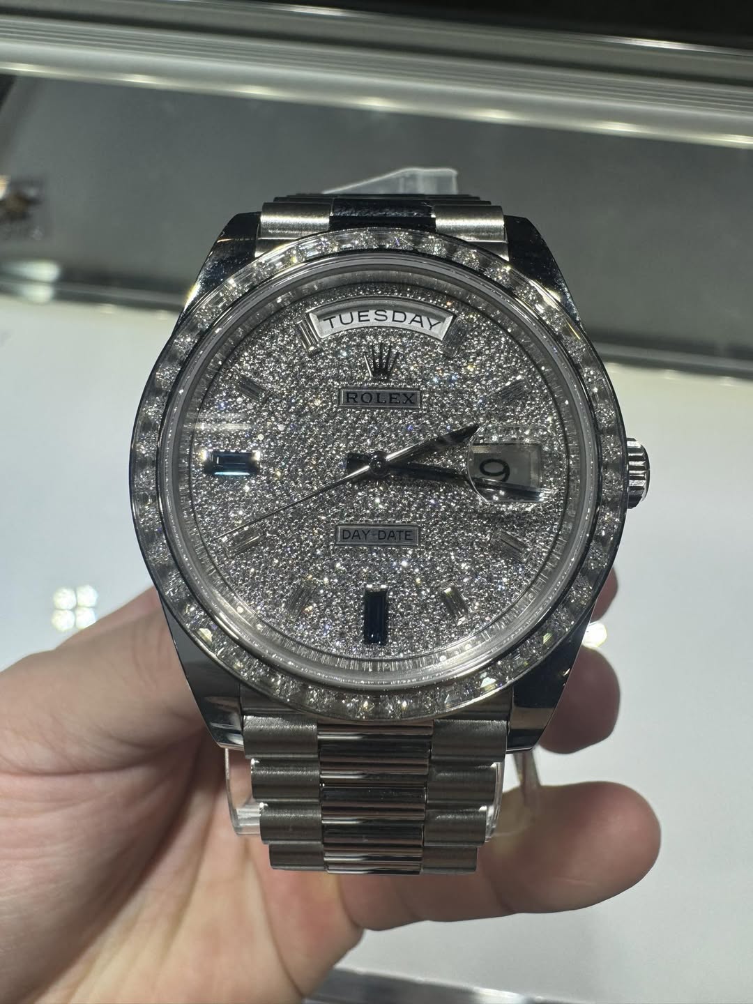May be an image of wrist watch and text