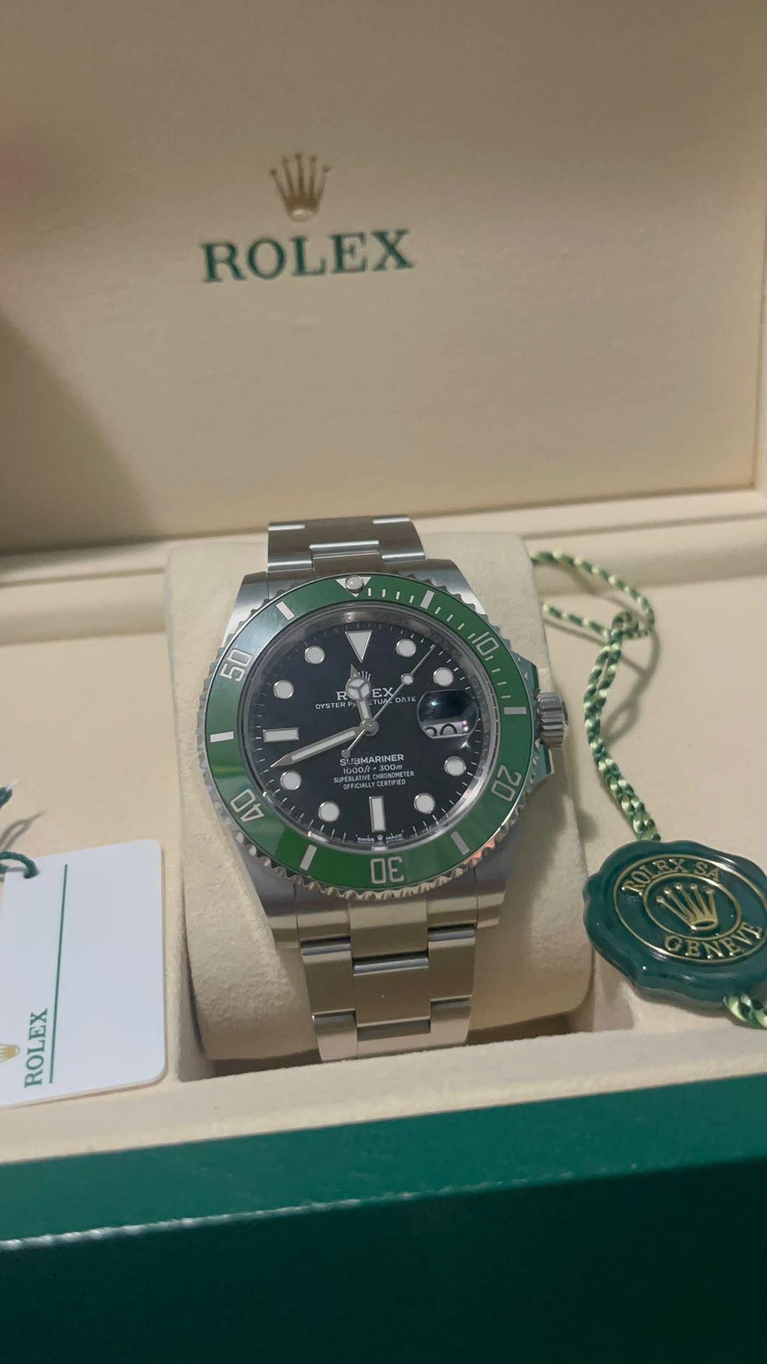 May be an image of wrist watch and text
