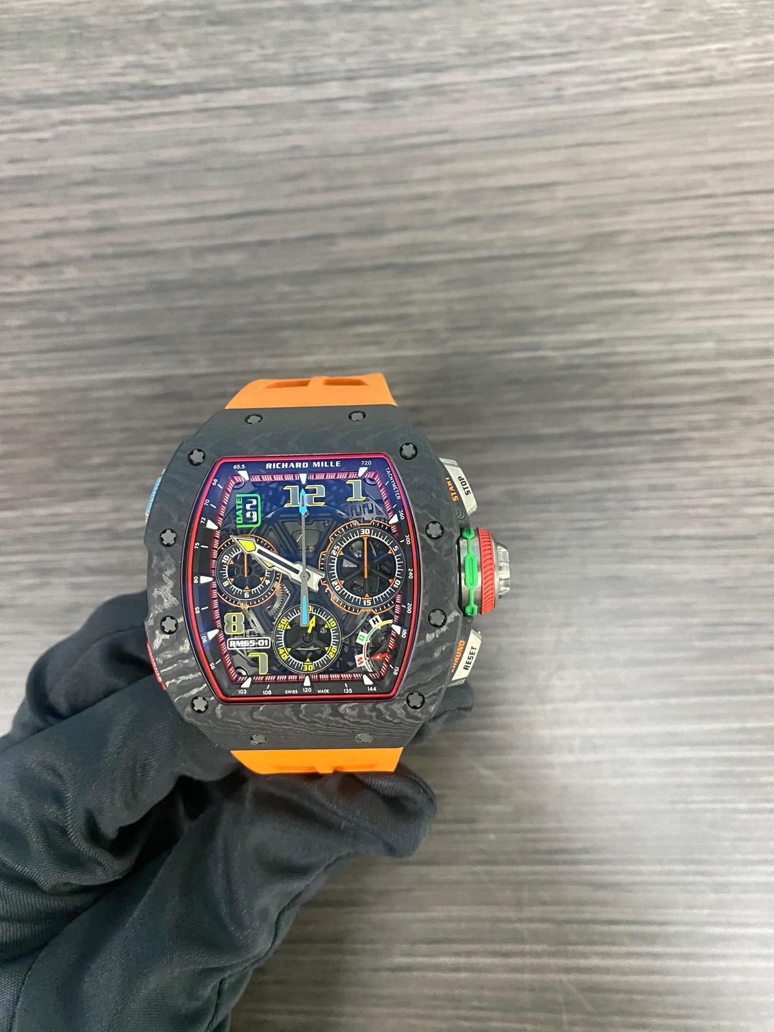 May be an image of wrist watch and text