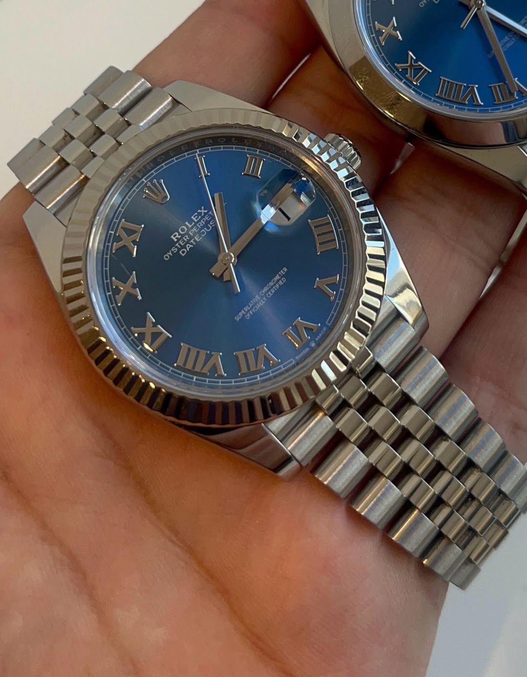 May be an image of wrist watch and text that says 'ROLEX RO EJU OY DA O ATEJUS A I조.'