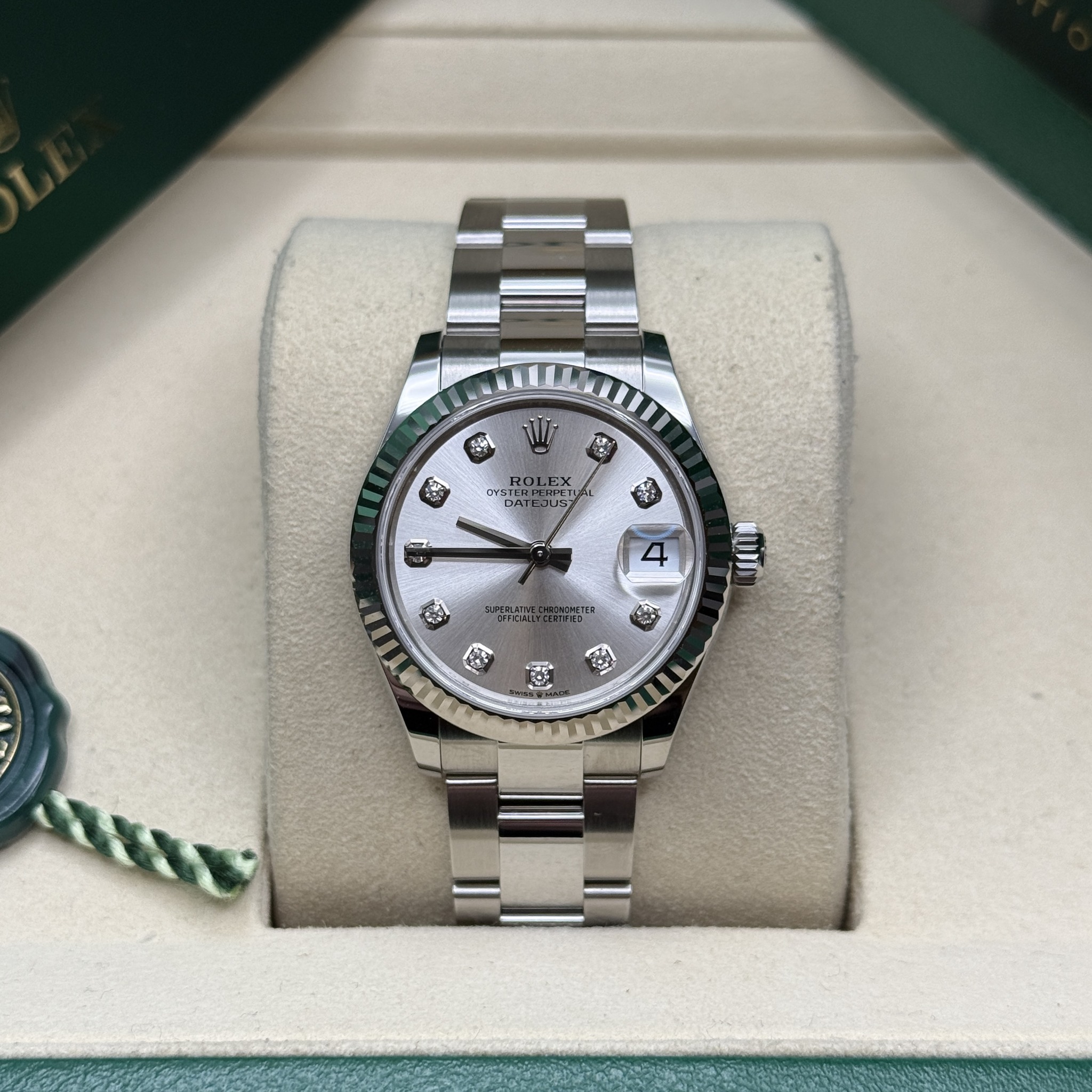 May be an image of wrist watch and text