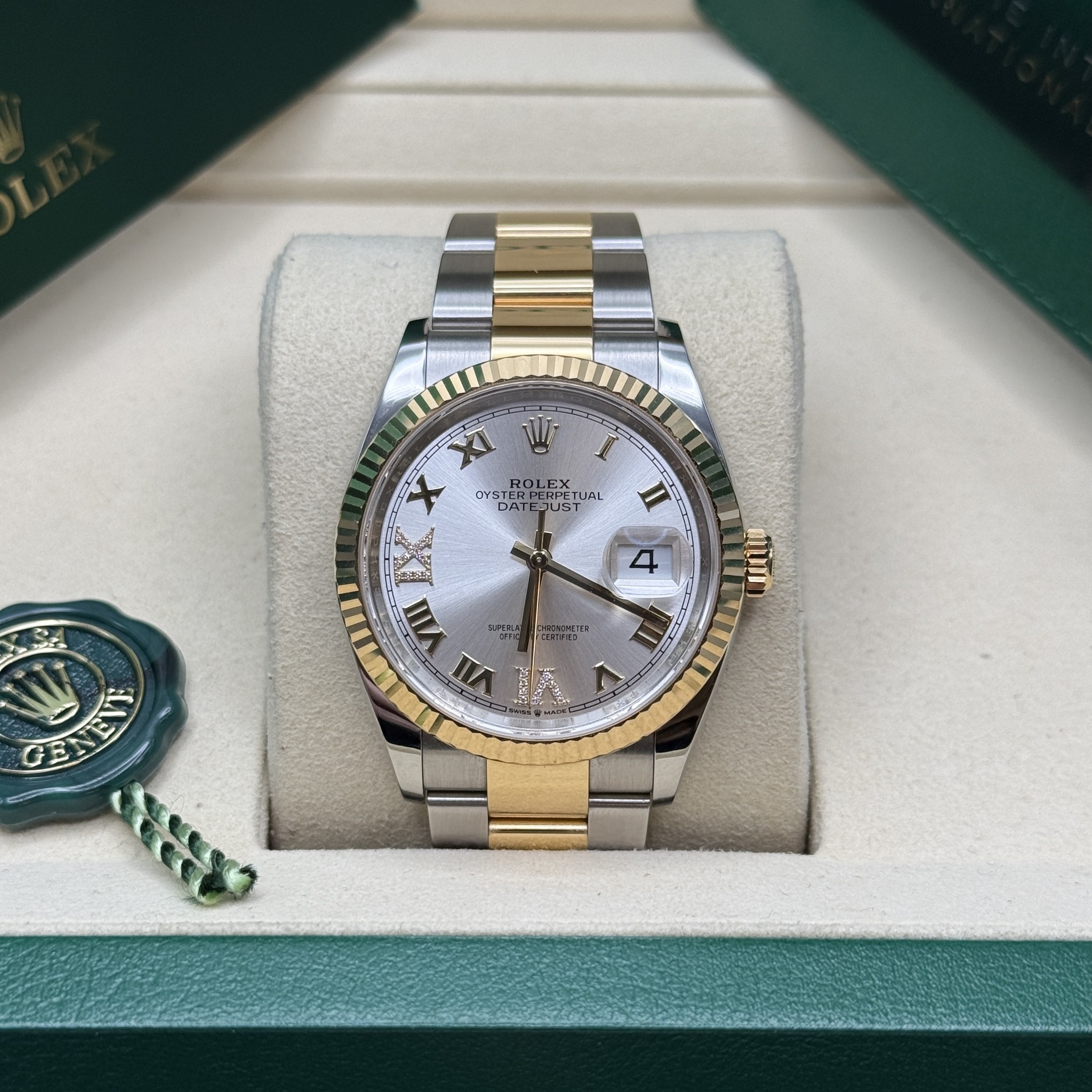 May be an image of wrist watch and text