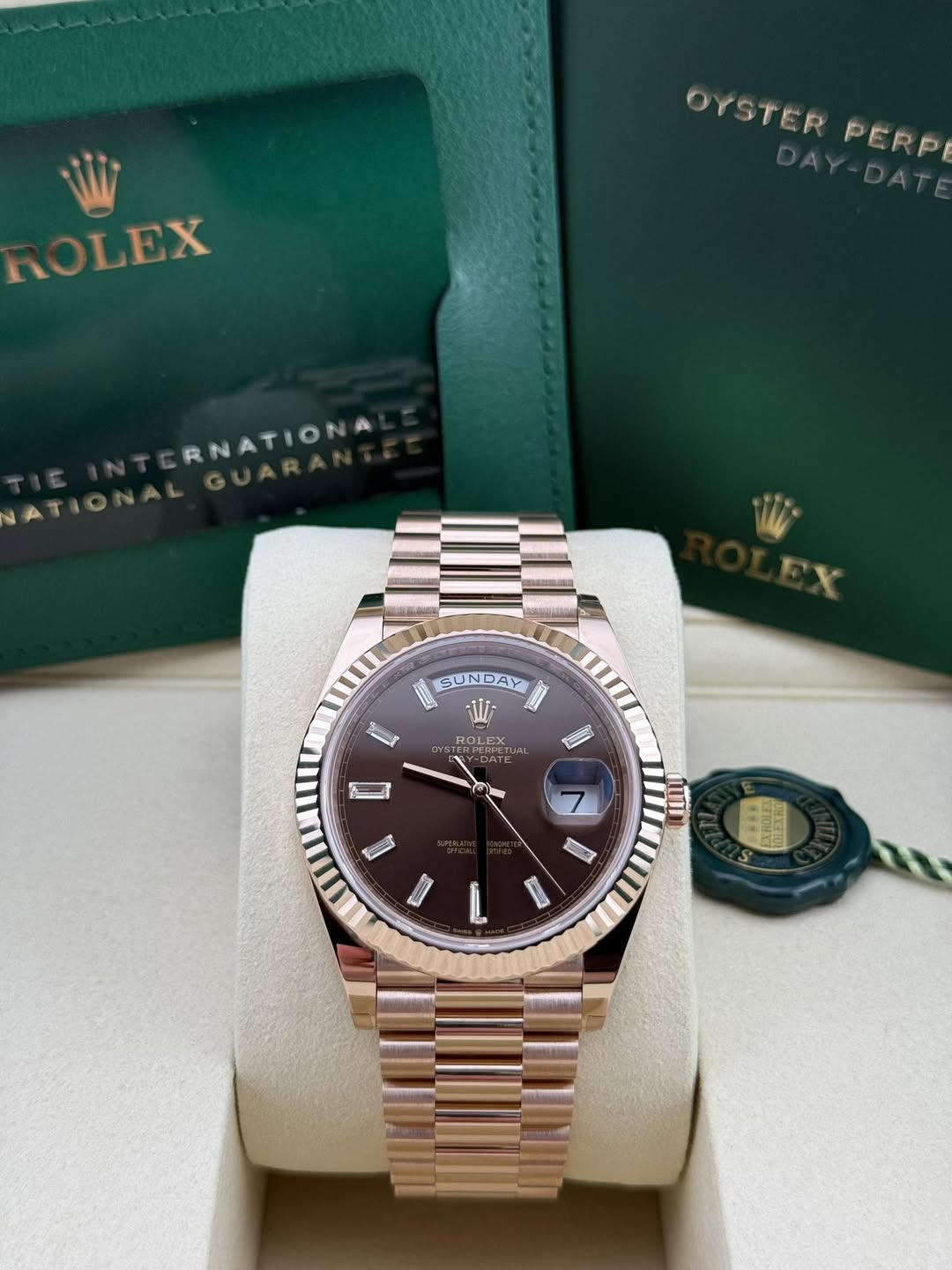 May be an image of wrist watch and text