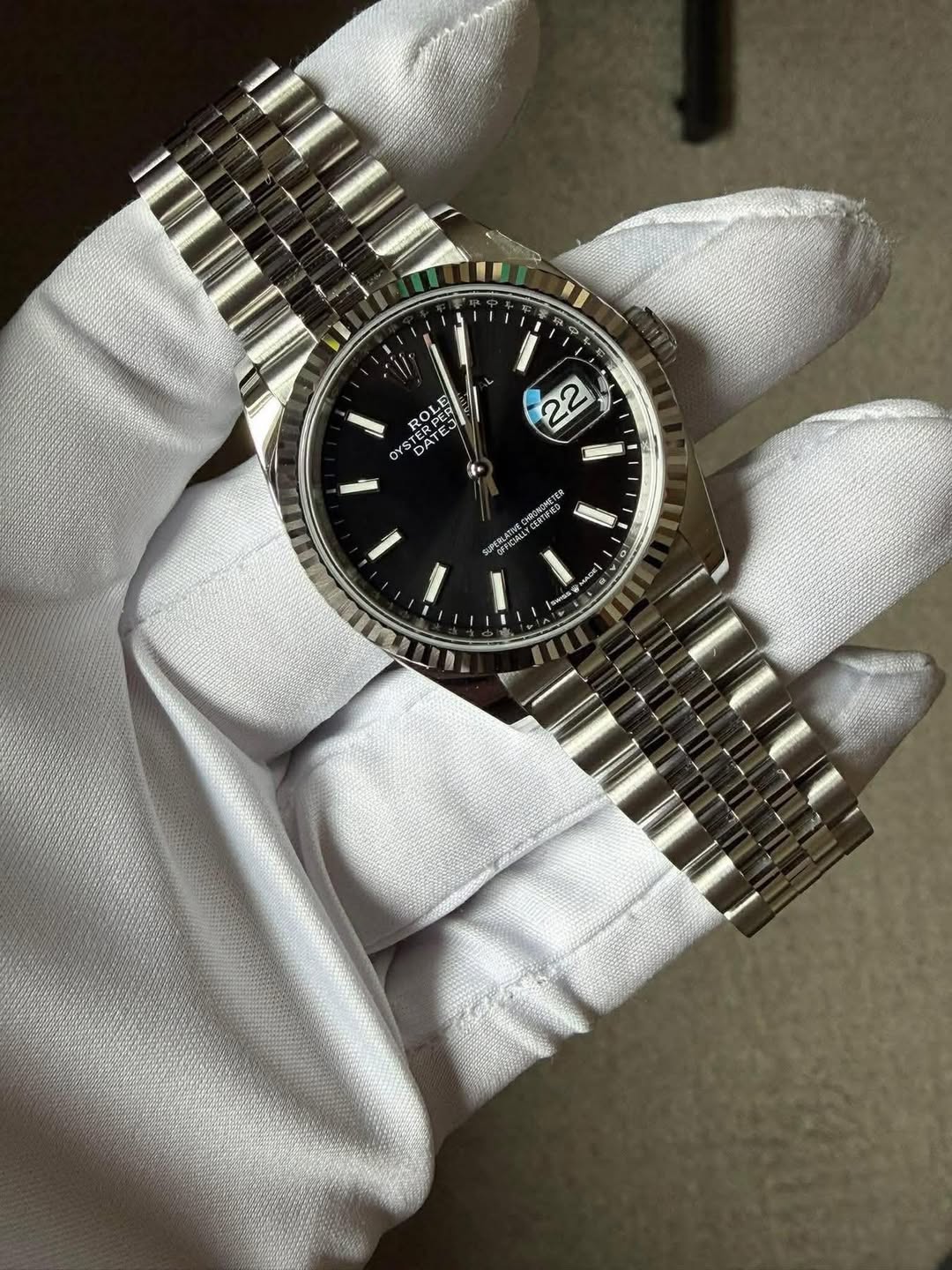 May be an image of wrist watch