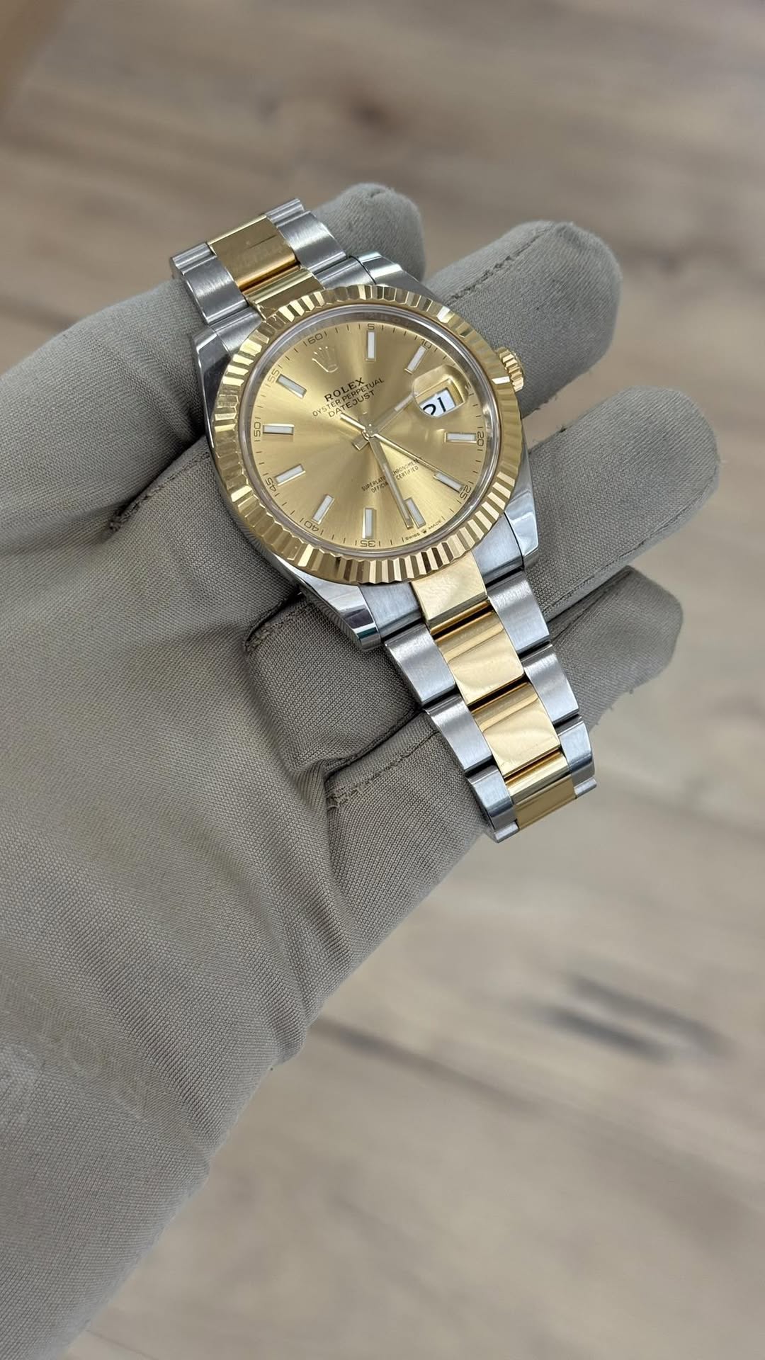 May be an image of wrist watch and text