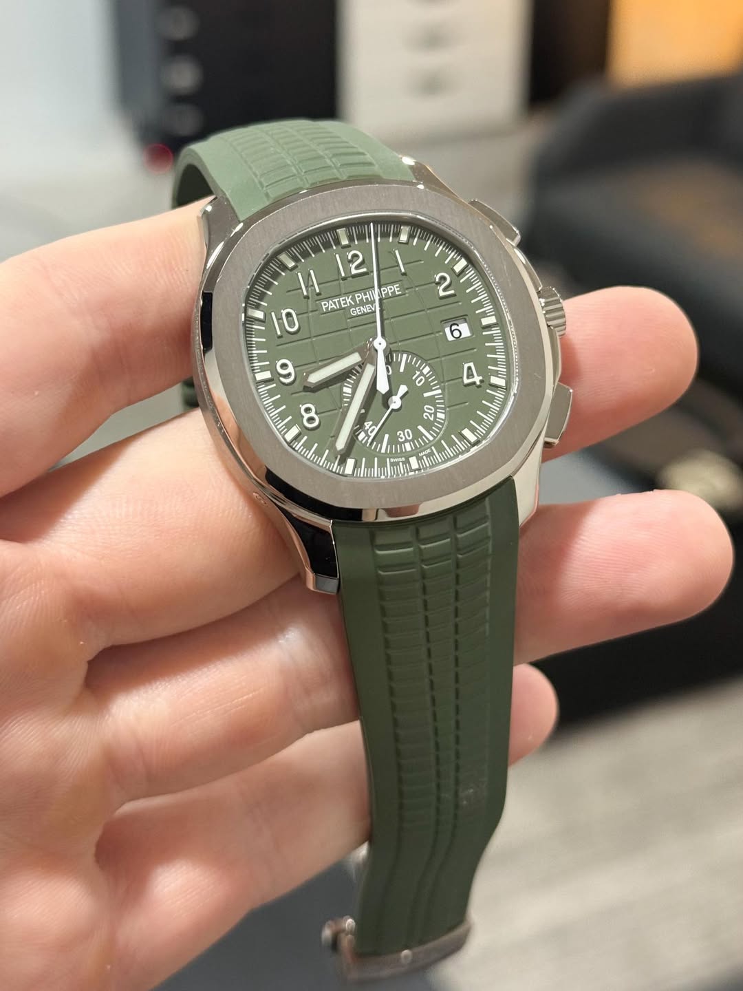 May be an image of wrist watch and text