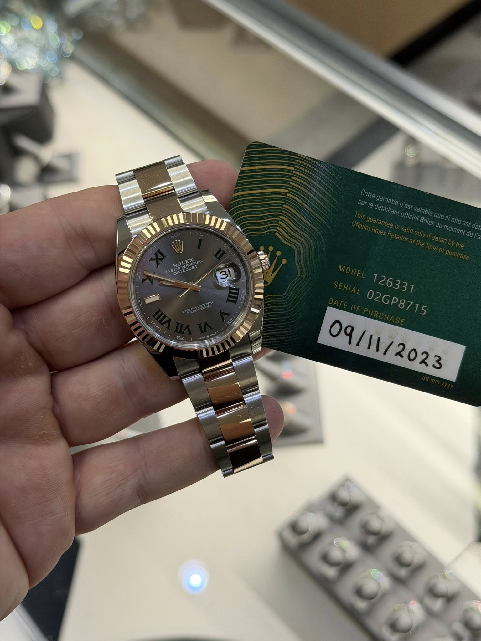 May be an image of wrist watch and text
