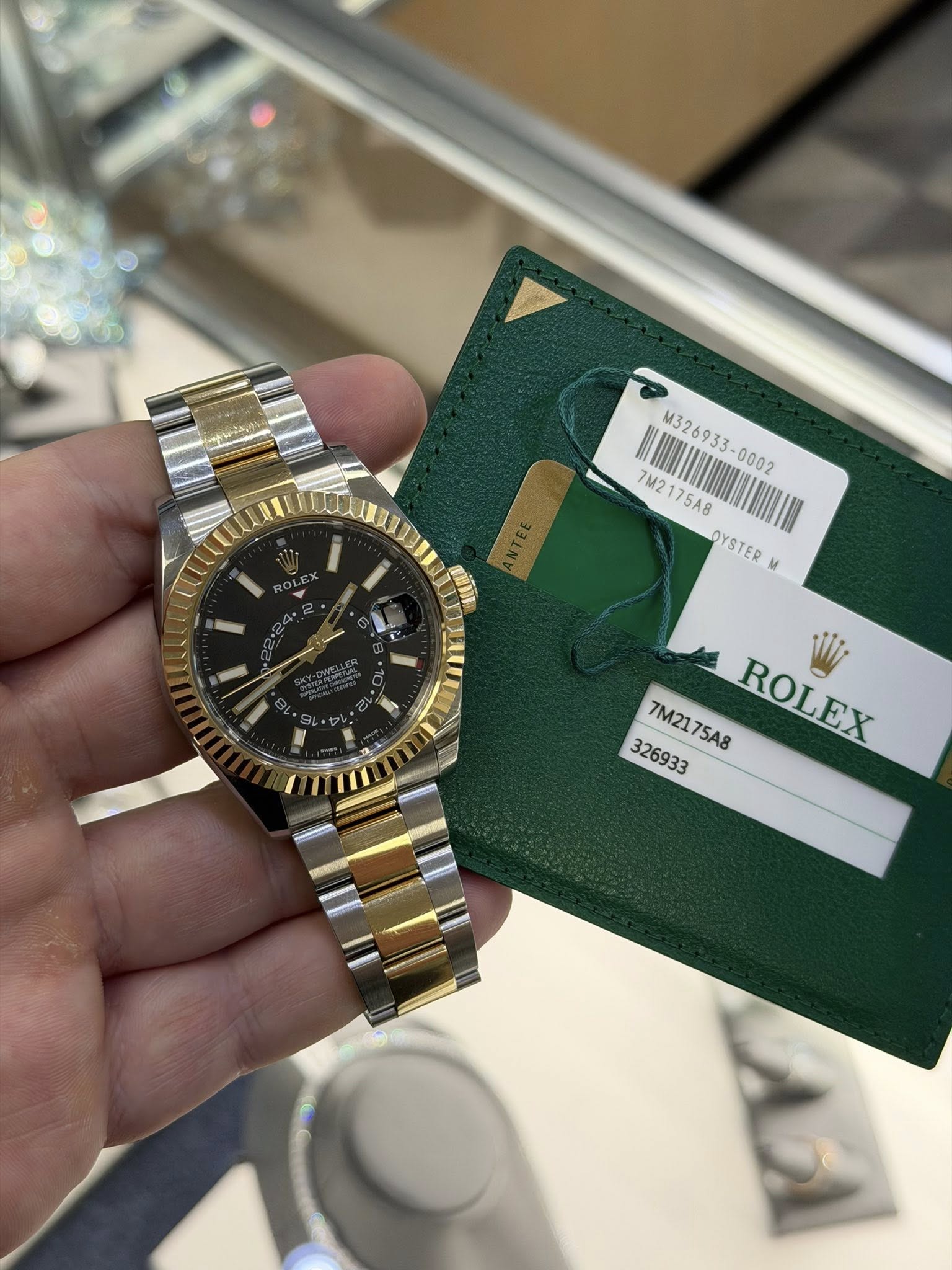 May be an image of wrist watch and text