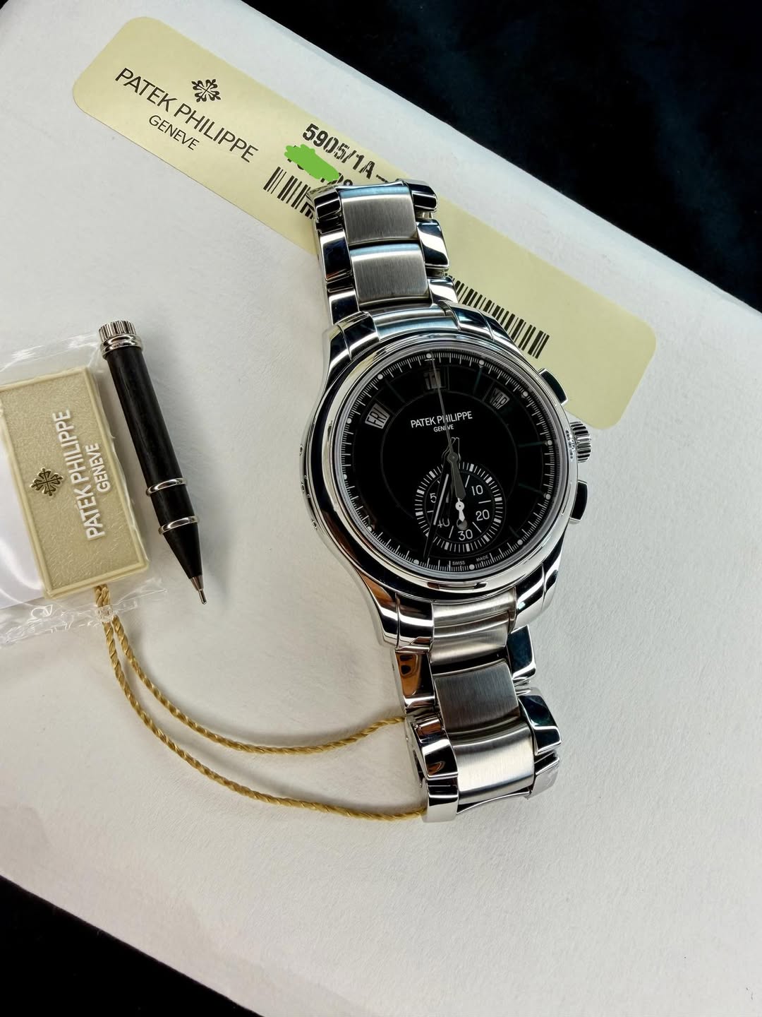 May be an image of digital watch and text that says 'PATEKPHILIPPE PATEPILPE 美 PATEK GENEVE PHILIPPE 王子 5905/1a 5905/1A- 10 PATEKP KTEKPIWIPPE LUPPE Mit PATEKPHILIPPE PHILIPPE…