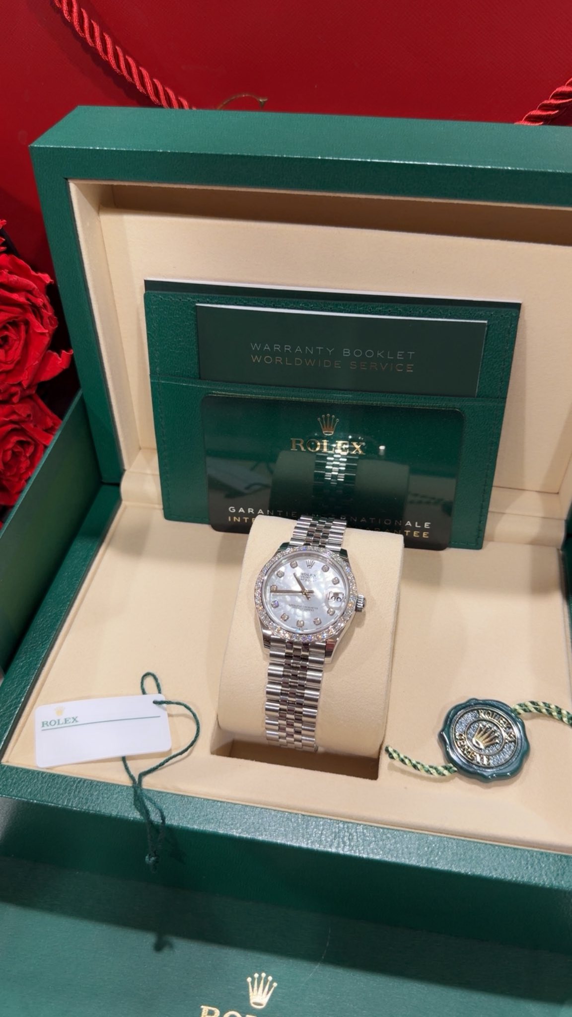 May be an image of wrist watch and text