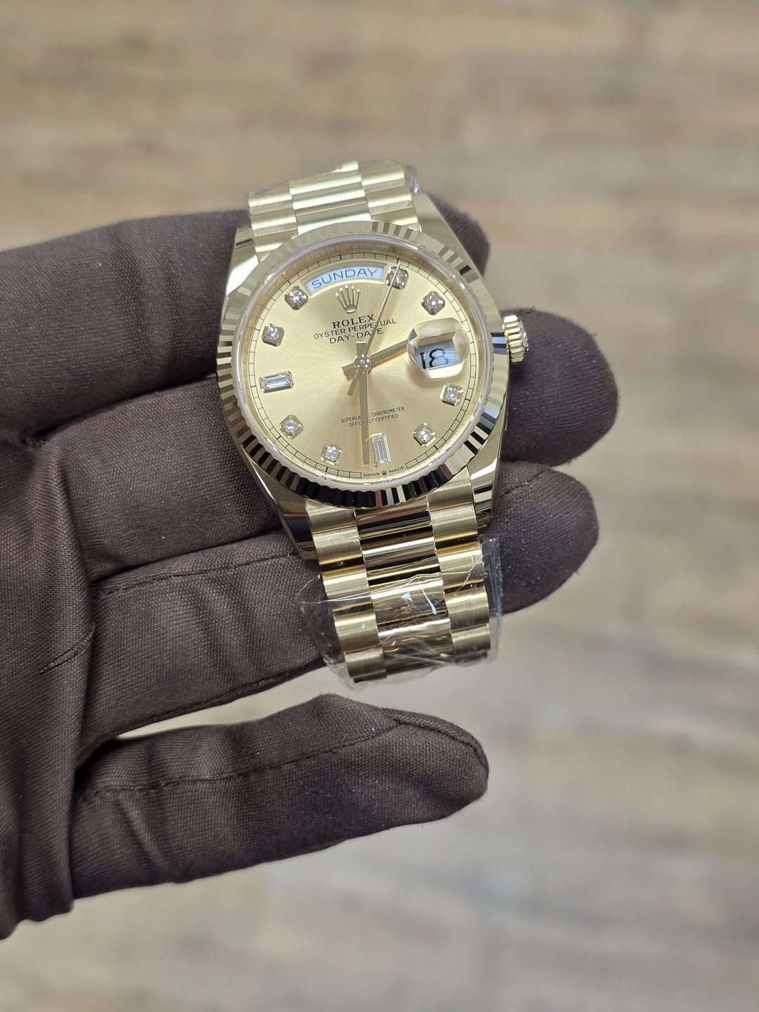 May be an image of wrist watch and text