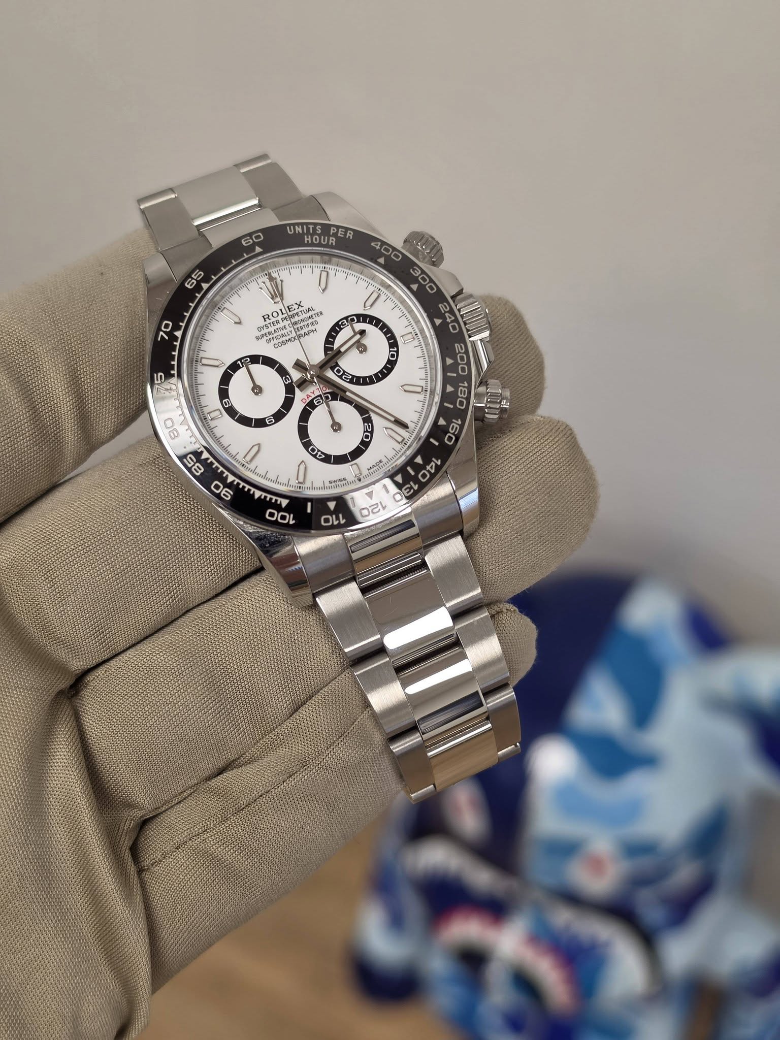 May be an image of wrist watch and text