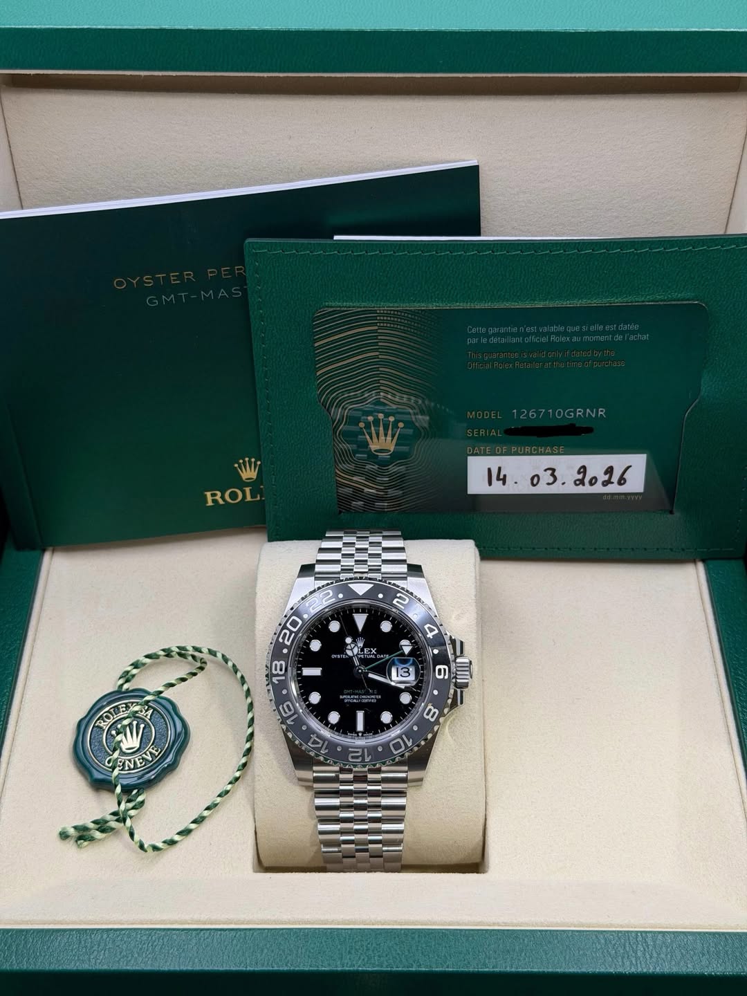 May be an image of wrist watch and text that says '26710GRNR W ROL பது்க. ex 2 4 ر マ 20 18 13 ហវ 6 S TOLE2A آكه ENEVE 6 ae 1 10'