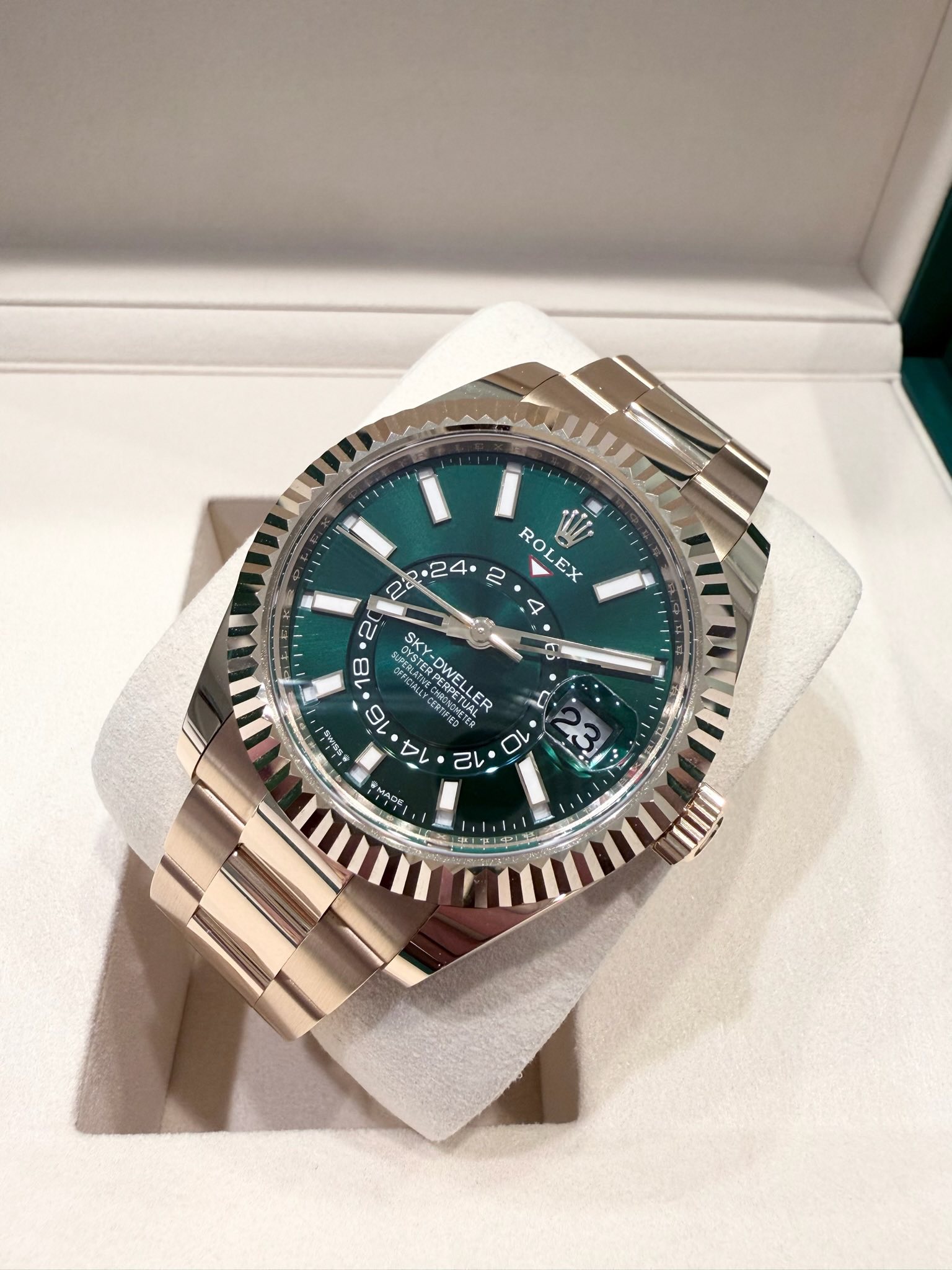 May be an image of wrist watch and text