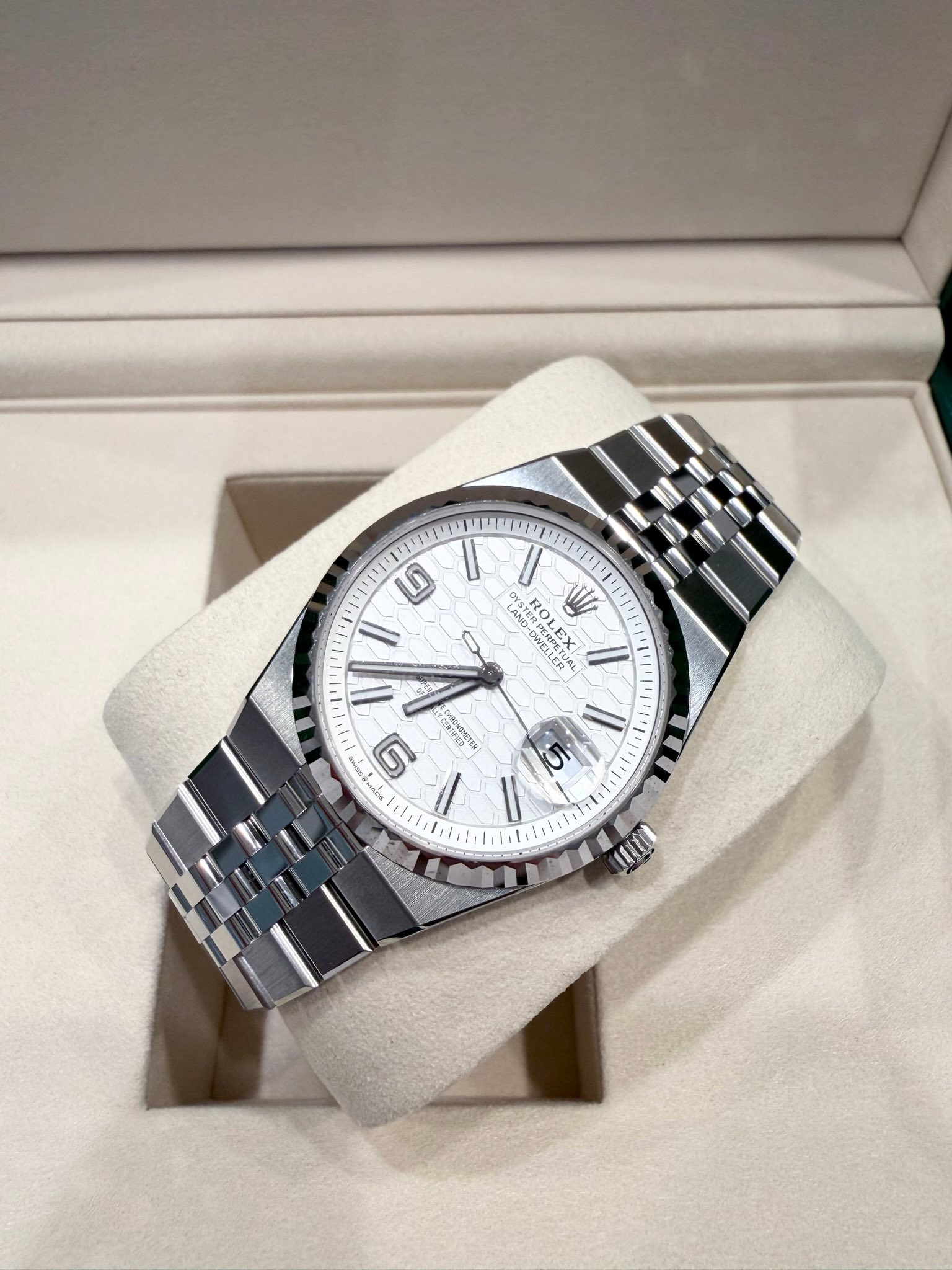 May be an image of wrist watch and text