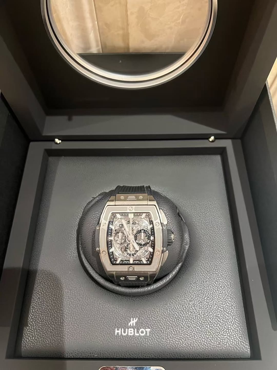 May be an image of wrist watch and text