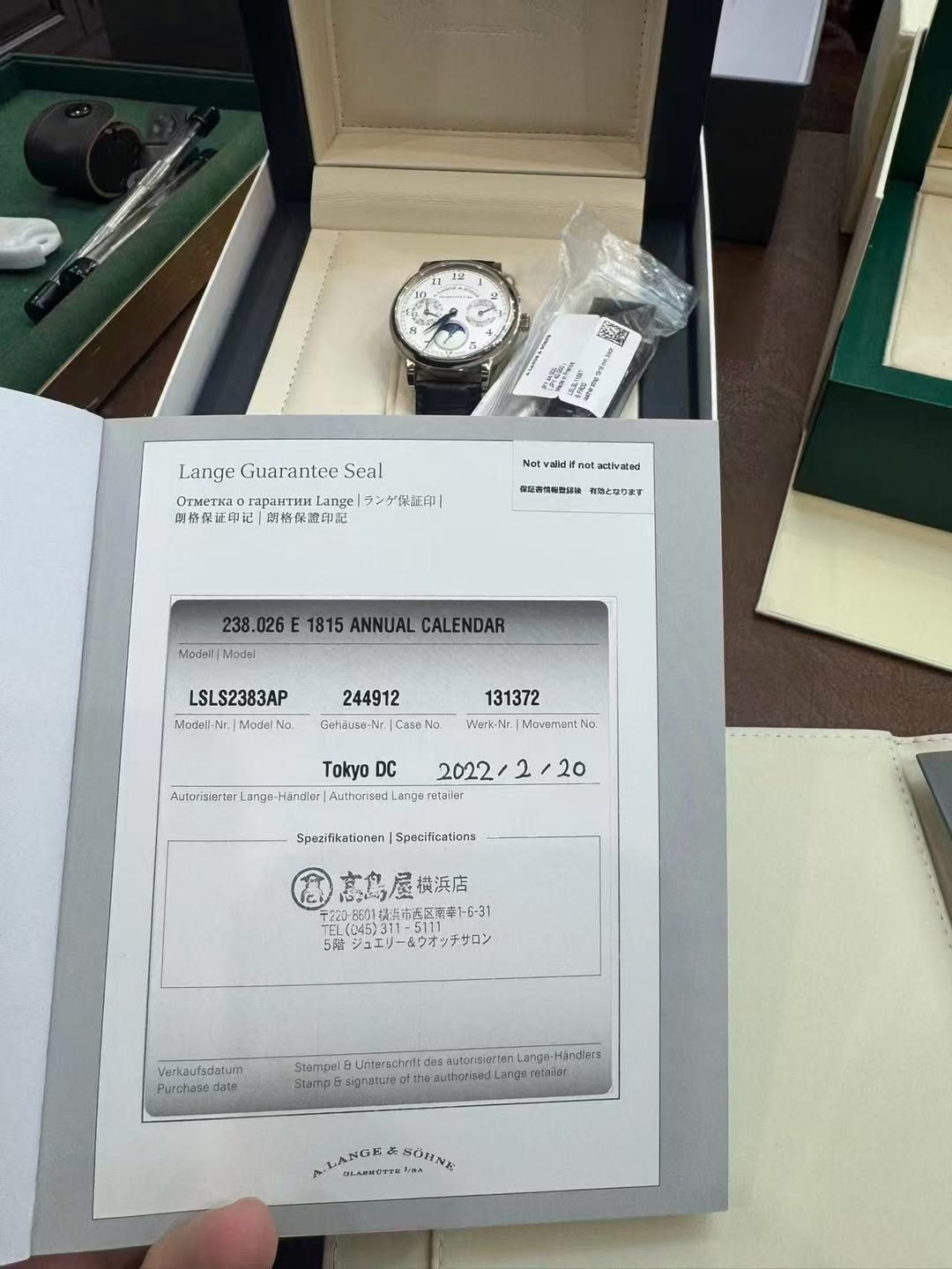 May be an image of wrist watch and text