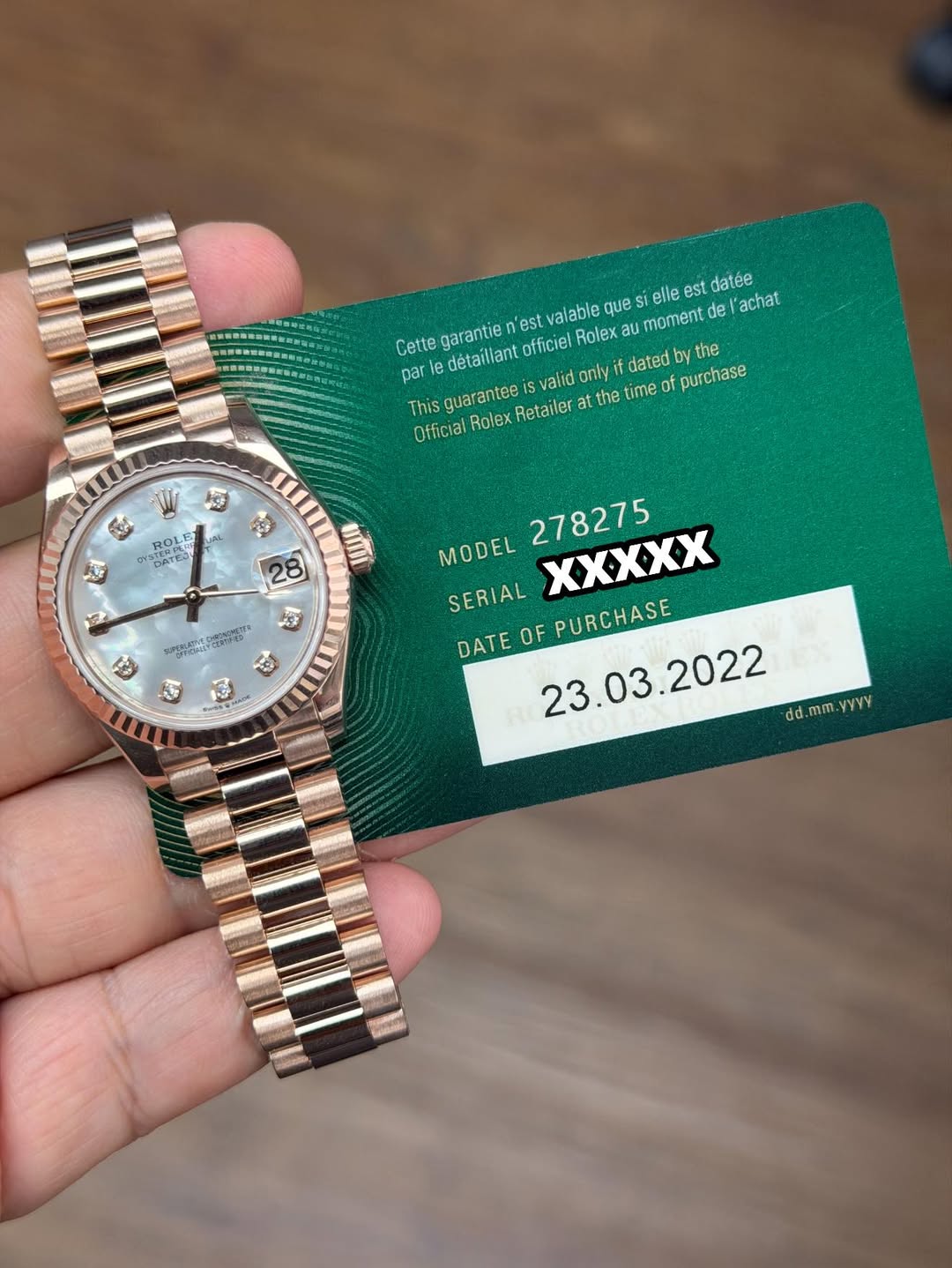 May be an image of wrist watch and text that says 'elle moment de 'achat est datée que S est valable Cette garantie par détaillant officiel Rolex au purchase This guarantee is…