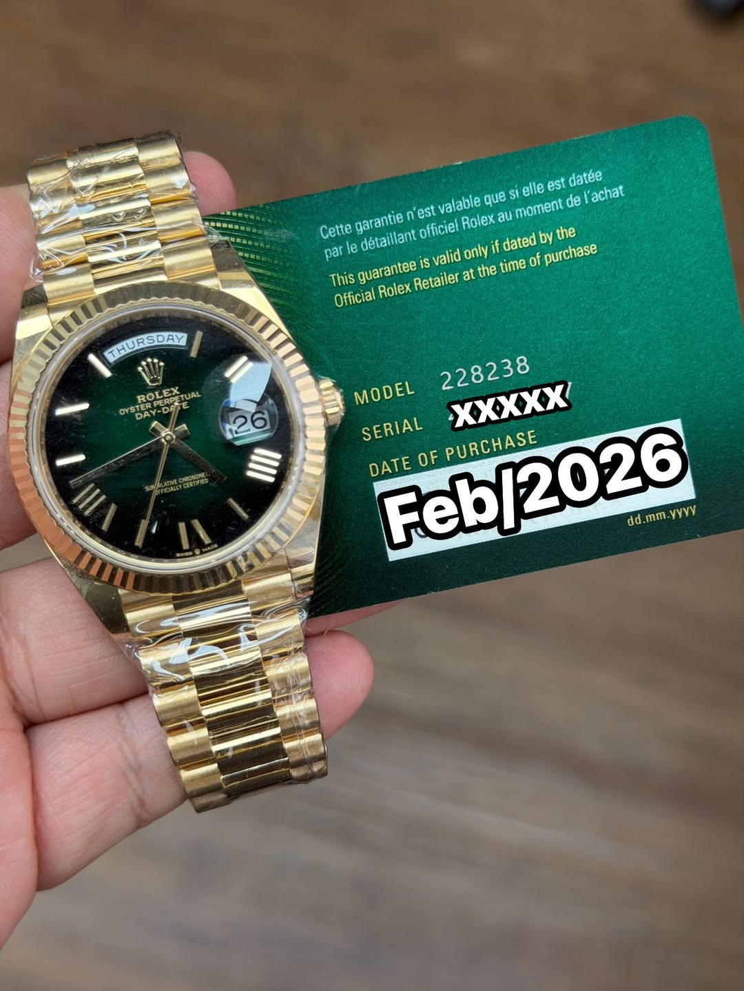 May be an image of wrist watch and text that says 'garantie détaillant officiel Rolex 'est valable que si elle est datée moment de l'achat Cette par le This guarantee valid only…