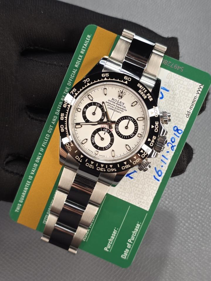 May be an image of wrist watch and text that says ' HOUR UNITS 9 PERLATVE OYSTERCE ROLEX ROLEX RPETUAL EX COSM OFFCALA pиoжoжeT MHETAA AAи 30 RETAILER. ROLEX OFFICIAL 70 THE 75…