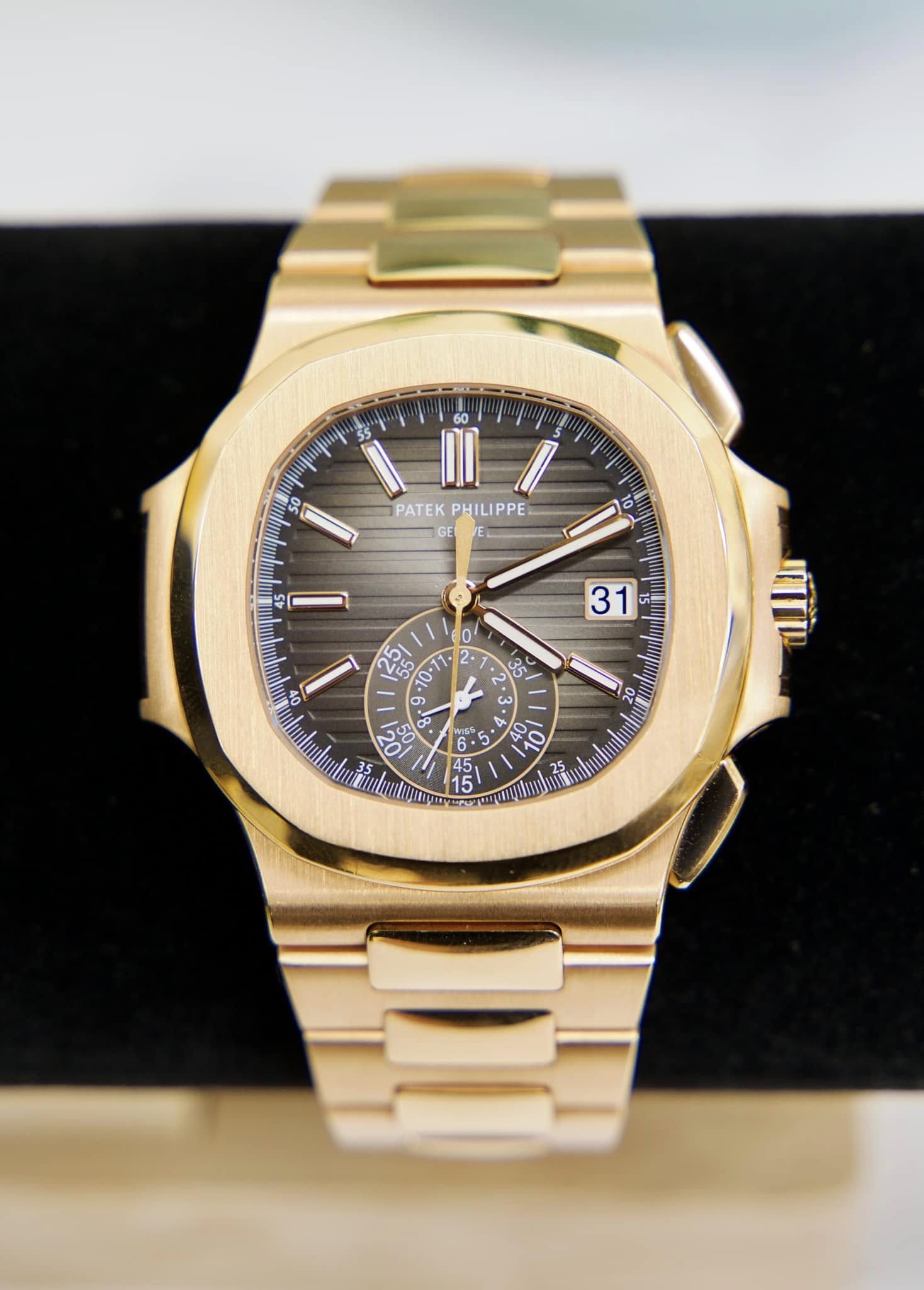 May be an image of wrist watch and text