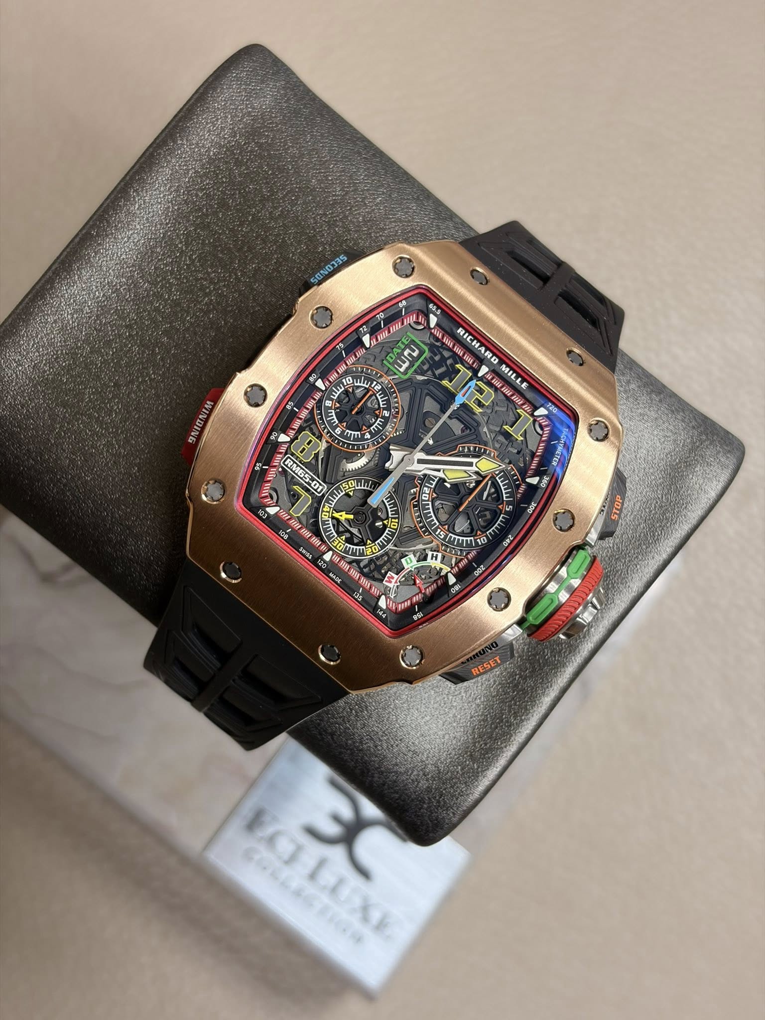 May be an image of wrist watch and text