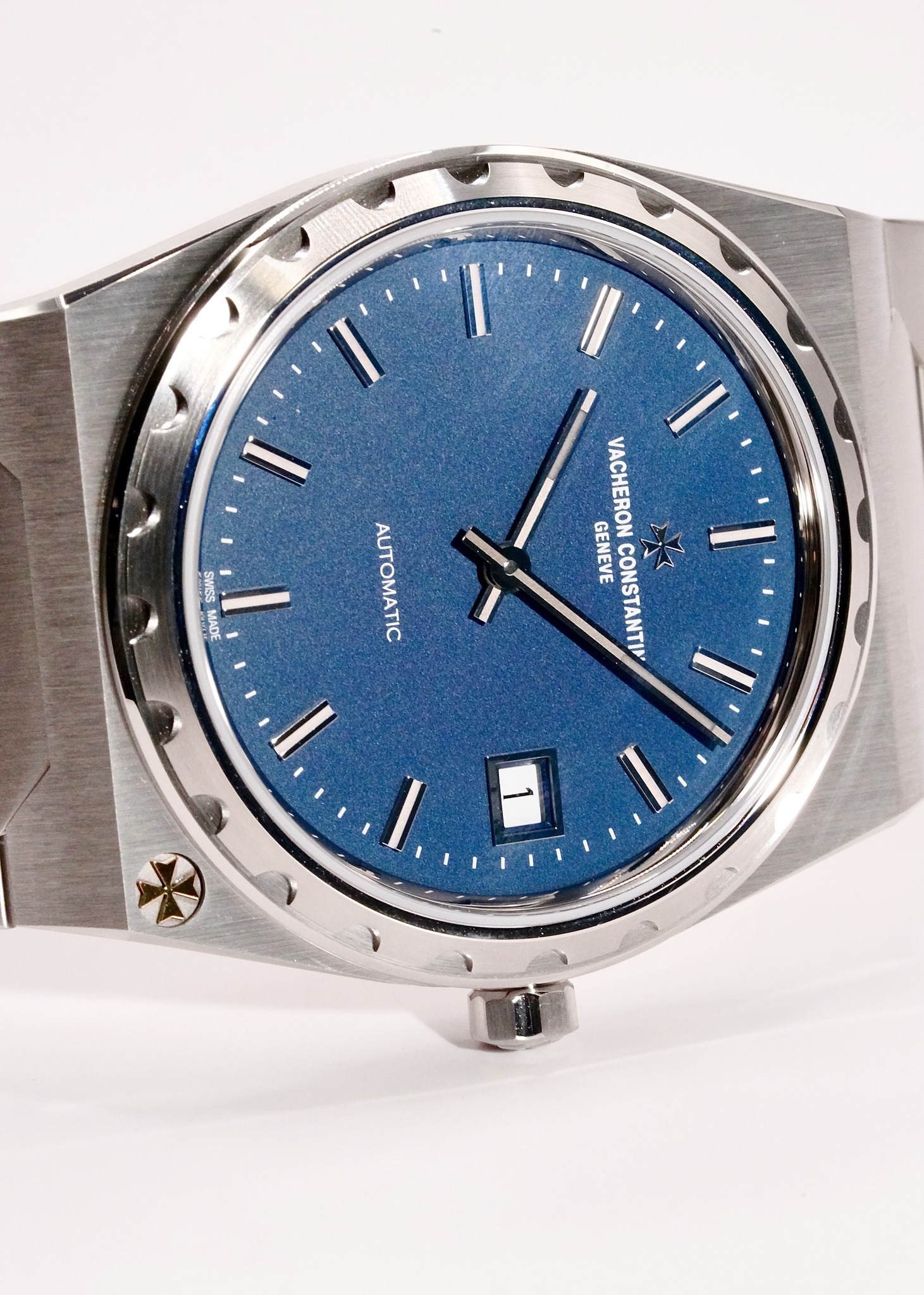 May be an image of wrist watch and text