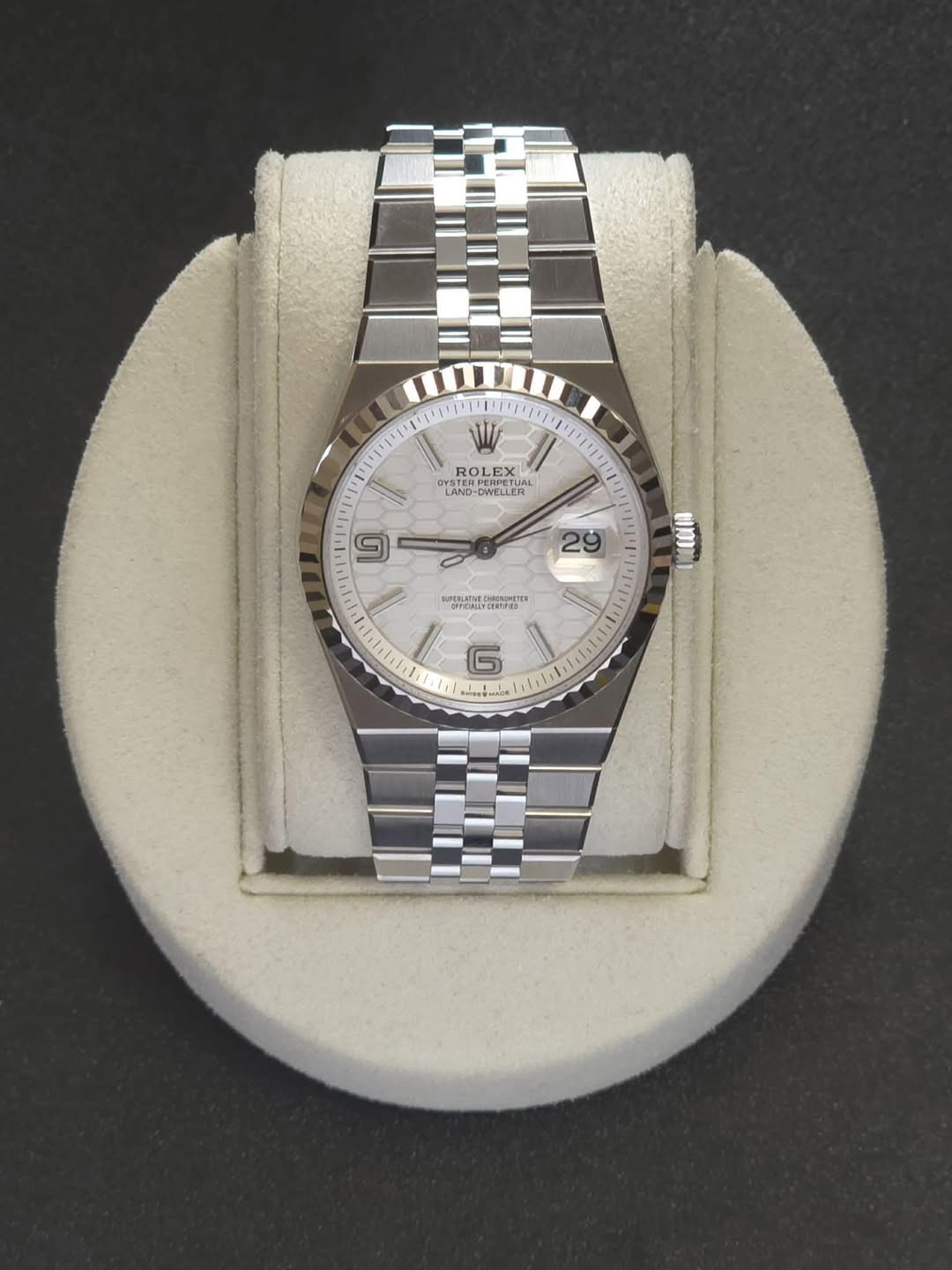May be an image of wrist watch and text