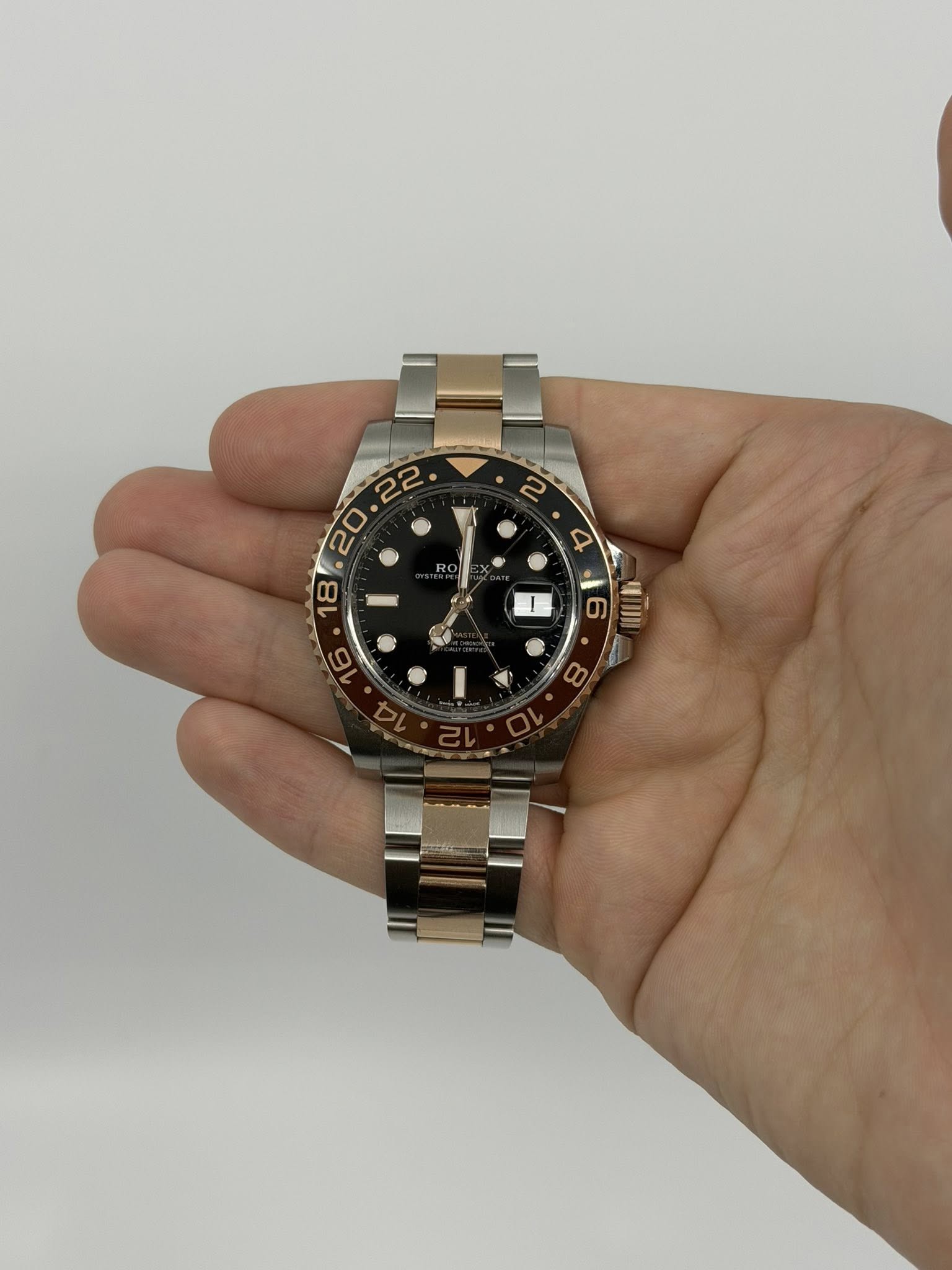 May be an image of wrist watch and text
