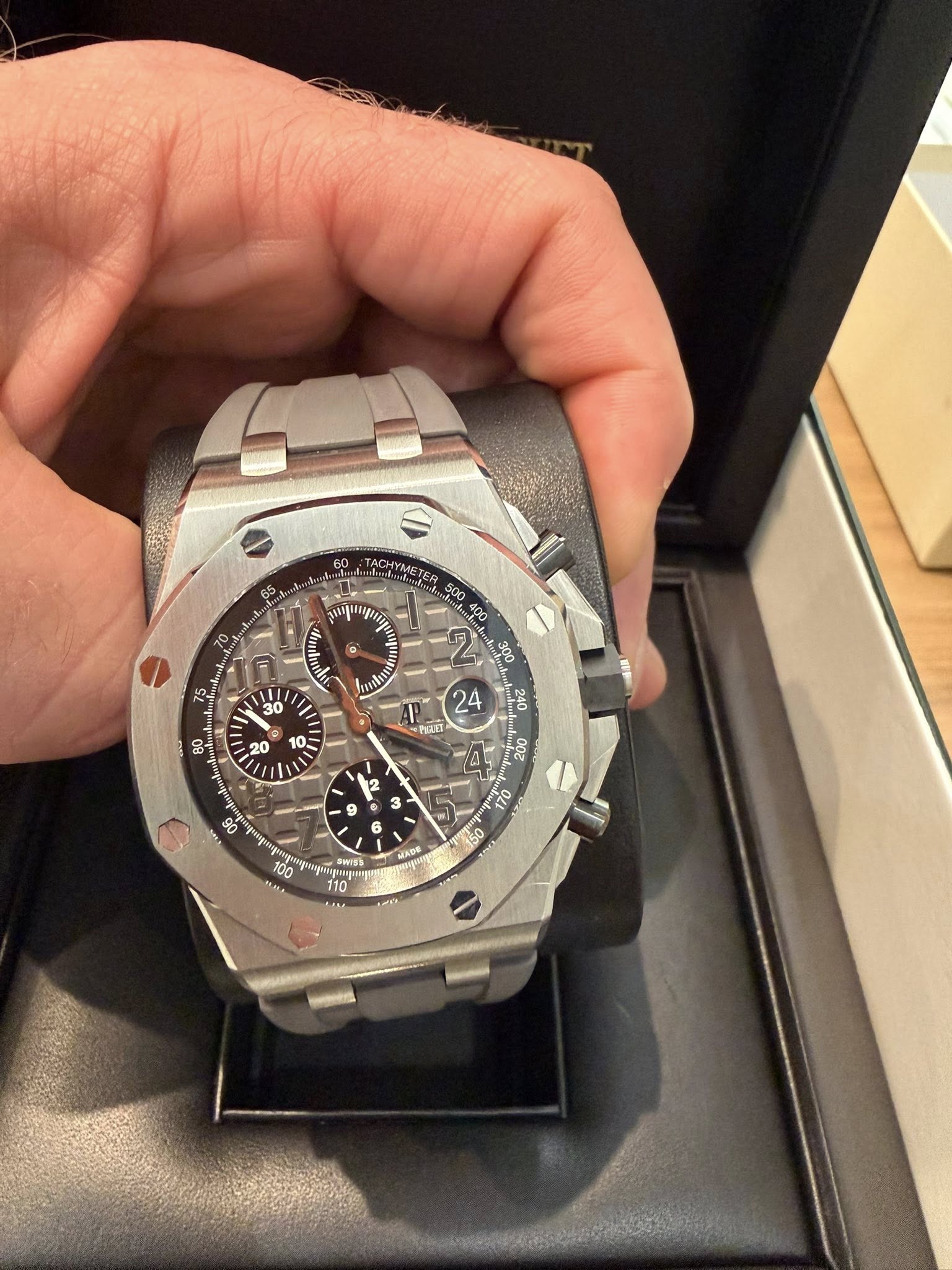 May be an image of wrist watch and text
