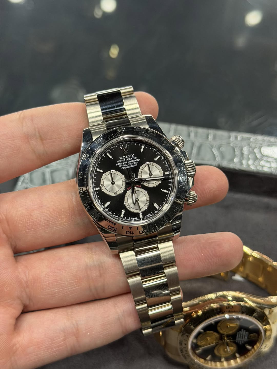 May be an image of wrist watch and text