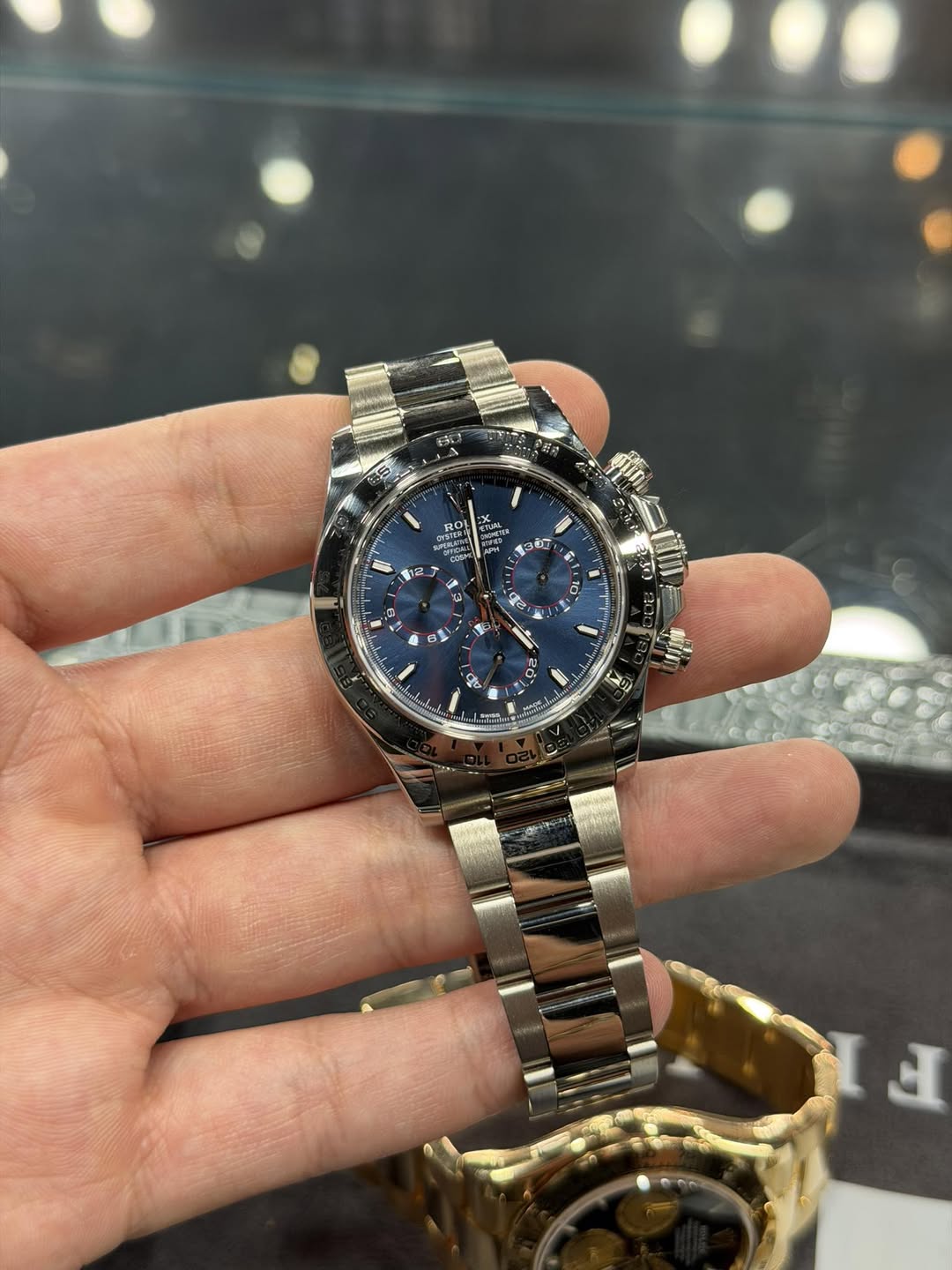 May be an image of wrist watch and text